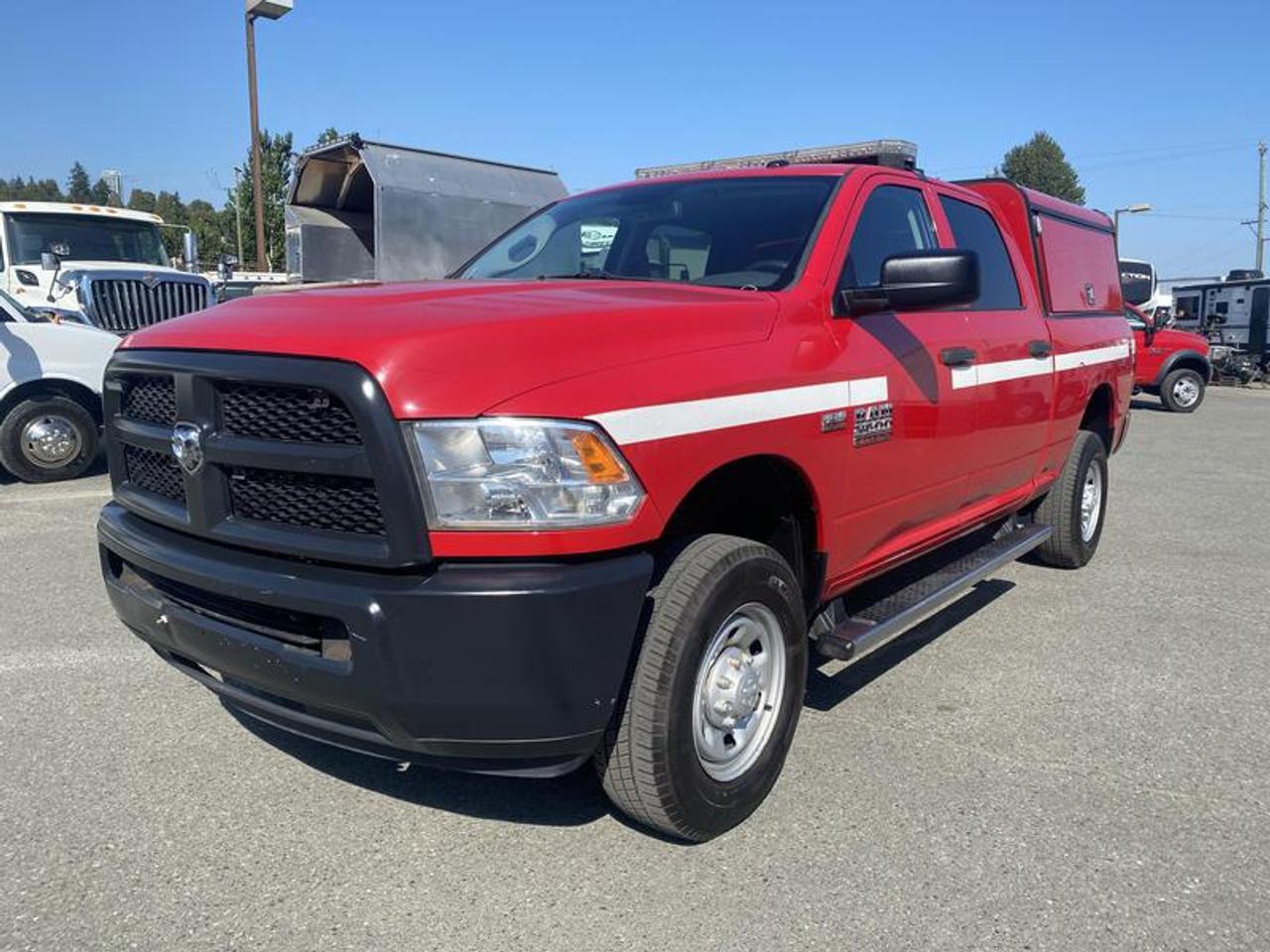 2015 RAM 2500 Ex Fire Truck Crew Cab SWB 4WD, rear bed slide , 5.7L, 8 cylinder, 4 door, automatic, 4WD, 4-Wheel ABS, cruise control, air conditioning, AM/FM radio, power door locks, power windows, red exterior, gray interior, cloth.  $21,530.00 plus $375 processing fee, $21,905.00 total payment obligation before taxes.   Listing report, warranty, contract commitment cancellation fee, financing available on approved credit (some limitations and exceptions may apply). All above specifications and information is considered to be accurate but is not guaranteed and no opinion or advice is given as to whether this item should be purchased. We do not allow test drives due to theft, fraud, acts of vandalism and undetectable impaired driving. Instead we provide the following benefits: Complimentary Warranty (with options to extend), Limited Money Back Satisfaction Guarantee on Fully Completed Contracts, Contract Commitment Cancellation, and an Open-Ended Sell-Back Option. Ask seller for details or call 604-522-REPO(7376) to confirm listing availability.