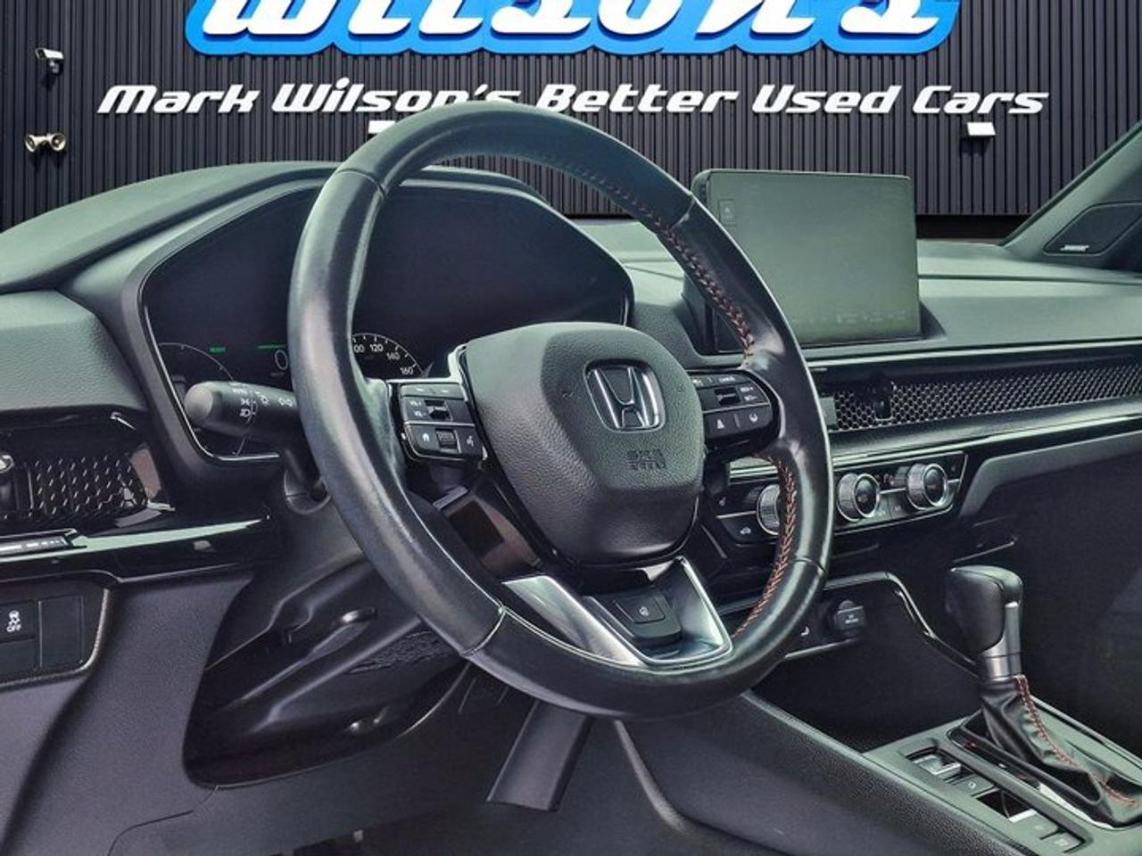 2023 Honda CR-V Hybrid Touring AWD | Leather | Sunroof | Nav | Heated Wheel + Seats | Adaptive Cruise | CarPlay & More ! Photo