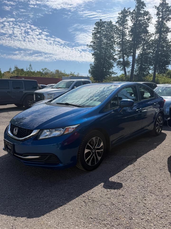 <p>2015 HONDA CIVIC EX BLUE - CLEAN, ECONOMICAL & READY TO DRIVE!</p><p>VERY CLEAN - SHARP LOOKING CIVIC EX WITH A SMOOTH, COMFORTABLE & CONFIDENT DRIVE!</p><p>FUEL-EFFICIENT GAS ENGINE - EASY TO DRIVE, PRACTICAL & GREAT FOR DAILY DRIVING, COMMUTING OR LONGER TRIPS!</p><p>EX TRIM WELL EQUIPPED WITH PRACTICAL FEATURES INCLUDING SUNROOF, BACKUP CAMERA, BLUETOOTH, CRUISE CONTROL, POWER WINDOWS, POWER LOCKS & A COMFORTABLE INTERIOR!</p><p>COMPACT SEDAN DESIGN WITH GREAT FUEL ECONOMY, EASY MANEUVERABILITY AND THE EVERYDAY PRACTICALITY HONDA CIVIC OWNERS LOVE!</p><p>PERFECT FOR DAILY DRIVING, COMMUTING, STUDENTS, FIRST-TIME BUYERS OR ANYONE LOOKING FOR A CLEAN, AFFORDABLE & DEPENDABLE VEHICLE!</p><p>EASY FINANCING AVAILABLE!</p><p>ADVERTISED PRICE IS OUR FINANCE PRICE.</p><p>DRIVETOWNOTTAWA.COM - COME VISIT US / VENEZ NOUS VISITER!</p><p>TAXES AND LICENSING EXTRA. SEE DRIVETOWNOTTAWA.COM FOR CASH PRICE. FINANCING CHARGES APPLY, INCLUDING BANK FEES, PPSA AND INTEREST. QUEBEC SAFETY FEE APPLICABLE.</p>