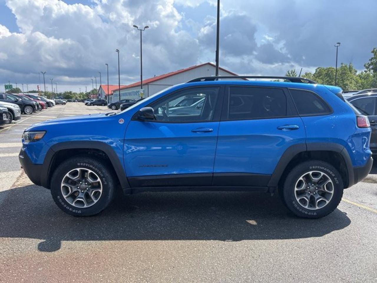 // ACCIDENT FREE!! //<br /><br />This 2022 Jeep Cherokee Trailhawk Elite 4x4 is built for drivers who want real Jeep capability with everyday comfort. Finished in Blue with a Black interior, this used SUV offers confident 4WD traction, a smooth automatic transmission, and strong 3.2-litre gas power for the road ahead.<br /><br />With 113,955 km, this Cherokee Trailhawk Elite 4x4 delivers a proven blend of utility, comfort, and smart features. Its four-door design makes access easy for passengers and cargo, while its accident-free history adds welcome peace of mind for your next drive from Cayuga and beyond.<br /><br />FEATURES OF THE Cherokee Trailhawk Elite 4x4 | No Accidents | Leather Seats | Ventilated Seats | Heated Steering<br />   Accident-free history adds extra buying confidence<br />   Ventilated front seats help summer comfort<br />   Heated steering wheel warms cold mornings<br />   Four-wheel drive supports year-round traction<br /><br />ADVANCED SAFETY FEATURES<br />   Backup camera helps with safer reversing<br />   Blind spot monitor boosts lane awareness<br />   Stability control supports secure handling<br />   Side and head airbags add protection<br /><br />PERFORMANCE AND EFFICIENCY<br />   3.2-litre gas engine delivers solid power<br />   Automatic transmission shifts smoothly every trip<br />   Four-wheel drive adds all-season confidence<br />   Limited slip differential aids traction<br /><br />COMFORT AND CONVENIENCE<br />   Heated front seats add winter comfort<br />   Dual-zone climate control keeps balance<br />   Remote starter adds daily convenience<br />   Push button start simplifies departures<br /><br />TECHNONOLGY AND CONNECTIVITY<br />   Bluetooth integration supports hands-free calling<br />   Satellite radio expands listening choices<br />   Steering wheel audio controls add ease<br />   Automatic headlights improve simple operation<br /><br />CARGO SPACE<br />   Rear trunk access makes loading easier<br />   Four-door layout supports daily versatility<br />   Rear spoiler adds sporty utility style<br />   Spare tire adds backup reassurance<br /><br />AWARDS & RECOGNITIONS<br />   Top Safety Pick, Insurance Institute for Highway Safety, 2022<br /><br />WHAT OTHER OWNERS LIKE<br />   Strong V6 power for passing confidence<br />   Comfortable ride for daily commuting<br />   Useful four-wheel drive in winter<br />   Easy-to-use controls and infotainment layout<br /><br />This 2022 Jeep Cherokee Trailhawk Elite 4x4 stands out with the features drivers use every day. Heated mirrors, power windows, power steering, and electric mirrors help make each trip simple. Tinted windows, fog lights, LED headlamps, and turn signal mirrors add useful function with a clean, capable look.<br /><br />Inside, this 2022 Jeep Cherokee Trailhawk Elite 4x4 offers comfort that fits Canadian driving. Ventilated front seats help on warm days, while heated front seats and the heated steering wheel are welcome when temperatures drop. Front air conditioning, automatic climate control, and dual-zone climate control help keep the cabin comfortable in every season.<br /><br />This 2022 Jeep Cherokee Trailhawk Elite 4x4 also gives you practical driver-focused details. The drivers power seat and lumbar support help you find a comfortable position, and the adjustable steering wheel makes it easier to tailor the fit. An auto-dimming rearview mirror and illuminated vanity mirrors add convenience during early starts and late drives.<br /><br />Capability remains a key part of this 2022 Jeep Cherokee Trailhawk Elite 4x4. Off-road tires, a rear tow hook, four-wheel drive, and limited slip differential help it handle rougher conditions with confidence. Anti-lock braking system, tire pressure monitoring, child safety locks, and automatic door locks round out a smart and useful feature set.<br /><br />Available now at Haldimand Motors Ltd. in Cayuga, this 2022 Jeep Cherokee Trailhawk Elite 4x4 is a well-equipped SUV that balances comfort, traction, and everyday versatility. It is ready for commuting, family duty, weekend travel, and changing Ontario weather with the confidence Jeep drivers expect.<br /><br />This 2022 Jeep Cherokee Trailhawk Elite 4x4 | No Accidents | Leather Seats | Ventilated Seats | Heated Steerings VIN is: 1C4PJMBX6ND549666 .<br /><br />WHY CHOOSE US? <br /><br />Honest & Transparent Buying Experience: Weve been a trusted name in business since 1984.<br /><br />STRAIGHTFORWARD PRICING:<br />Our Advertised Price Includes:<br />>>Safety Certification (No separate fee!)<br />>>30-Day 100% Mechanical Warranty<br />>>FREE Carfax History Report.<br />>>No upcharge for paying cash.<br />(Prices Exclude HST and Licensing Fees only.)<br /><br />>>Browse 300+ vehicles all in ONE LOCATION<br /><br />EASY FINANCING: Great rates & open loans<br /><br />WE BUY CARS: Get Top Dollar for your trade-in, or sell us your vehicle for CASH! Even if you dont buy from us!<br /><br />STOP BY TODAY<br />Treat yourself - stop by Haldimand Motors Ltd. located at 42 Talbot St E, Cayuga, ON N0A 1E0 to make this car yours today!<br /><br />https://www.haldimandmotors.com/used/stock-461161.html