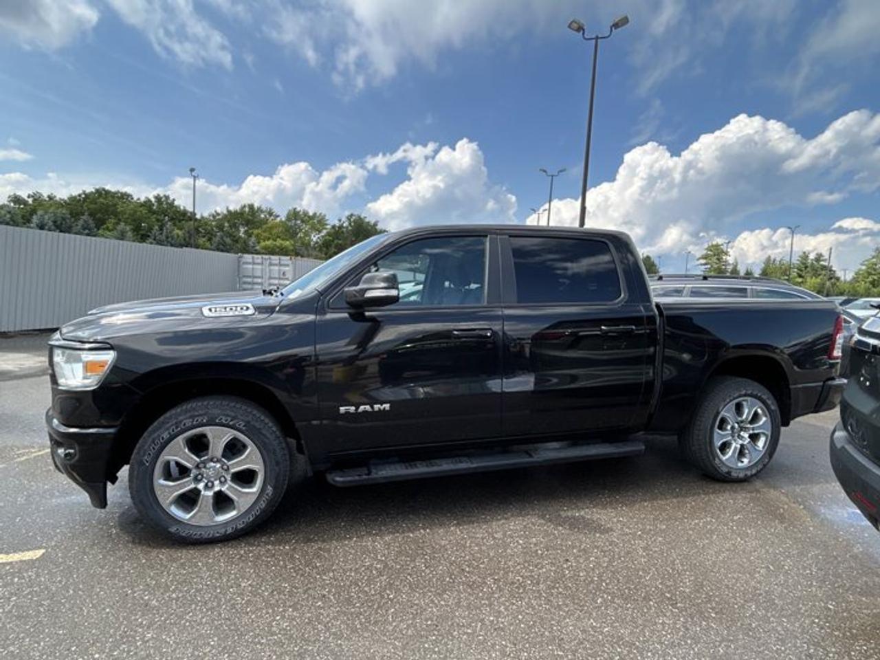 The 2022 RAM 1500 Big Horn Crew Cab 57 Box 4x4 is a full-size pickup built to handle hard work and daily life with equal confidence. This used truck at Haldimand Motors Ltd. in Cayuga pairs a bold Black exterior with a Grey interior, a 5.7-litre gas engine, and an 8-speed automatic transmission. With 66,649 km, this four-door RAM 1500 Big Horn Crew Cab 57 Box 4x4 delivers strong capability, smart comfort, and the heated steering wheel drivers appreciate on cold Canadian mornings.<br /><br />FEATURES OF THE 1500 Big Horn Crew Cab 57 Box 4x4 | Heated Steering Wheel<br /><br />   Heated steering wheel for cold mornings<br />   5.7-litre gas V8 power delivery<br />   Crew Cab with four full doors<br />   57 box for versatile hauling<br /><br />TRUCK FEATURES<br /><br />   Towing capacity rated at 5,152 kg<br />   Trailer hitch ready for towing tasks<br />   Four-wheel drive for added traction<br />   Rear tow hook supports recovery needs<br /><br />ADVANCED SAFETY FEATURES<br /><br />   Backup camera helps with reversing<br />   Anti-lock brakes support controlled stopping<br />   Stability control adds driving confidence<br />   Head and side airbags enhance protection<br /><br />PERFORMANCE AND EFFICIENCY<br /><br />   5.7-litre gas engine delivers strong power<br />   8-speed automatic shifts smoothly<br />   Four-wheel drive aids rough conditions<br />   Power steering supports easy maneuvers<br /><br />COMFORT AND CONVENIENCE<br /><br />   Heated mirrors help clear winter frost<br />   Front air conditioning keeps cabin comfortable<br />   Cruise control supports relaxed highway travel<br />   Push button start adds convenience<br /><br />TECHNONOLGY AND CONNECTIVITY<br /><br />   Apple CarPlay supports smartphone integration<br />   Android Auto keeps apps accessible<br />   Bluetooth integration enables hands-free calling<br />   Navigation system helps guide every trip<br /><br />CARGO SPACE<br /><br />   57 box handles everyday cargo<br />   Crew Cab adds interior storage flexibility<br />   Rear trunk access supports loading ease<br />   Spare tire adds practical preparedness<br /><br />AWARDS & RECOGNITIONS<br /><br />   Best Buy Award, The Car Guide, 2022<br />   Highest Ranked Large Light Duty Pickup, J.D. Power, 2022<br /><br />WHAT OTHER OWNERS LIKE<br /><br />   Strong V8 performance for towing confidence<br />   Smooth ride for a full-size truck<br />   Spacious Crew Cab for family use<br />   User-friendly tech and simple controls<br /><br />This 2022 RAM 1500 Big Horn Crew Cab 57 Box 4x4 stands out as a smart choice for drivers who want proven V8 strength, practical four-door space, and useful equipment already in place. The automatic headlights, fog lights, tinted windows, retractable mirrors, and turn signal mirrors add everyday function and clean design. Inside, the leather steering wheel, steering wheel audio controls, adjustable steering wheel, power windows, and automatic door locks help make every drive feel easy and well organized.<br /><br />Built for real truck duty, this 2022 RAM 1500 Big Horn Crew Cab 57 Box 4x4 is ready for work, towing, travel, and changing road conditions. The trailer hitch and 4WD setup support confident performance when the job gets demanding. At the same time, features like the backup camera, tire pressure monitoring system, passenger airbag sensor, child safety locks, and ambient lighting package help make this pickup a practical fit for many drivers.<br /><br />With its balance of strength, comfort, and useful technology, this RAM offers the capability many truck shoppers want without giving up daily convenience. From jobsite runs to weekend towing and family travel, it is equipped to do more. If you want a capable used pickup with V8 power, connected tech, and a well-rounded feature list, this truck deserves a close look.<br /><br />This 2022 RAM 1500 Big Horn Crew Cab 57 Box 4x4 | Heated Steering Wheels VIN is: 1C6SRFFT4NN174075.<br /><br />WHY CHOOSE US? <br /><br />Honest & Transparent Buying Experience: Weve been a trusted name in business since 1984.<br /><br />STRAIGHTFORWARD PRICING:<br />Our Advertised Price Includes:<br />>>Safety Certification (No separate fee!)<br />>>30-Day 100% Mechanical Warranty<br />>>FREE Carfax History Report.<br />>>No upcharge for paying cash.<br />(Prices Exclude HST and Licensing Fees only.)<br /><br />>>Browse 300+ vehicles all in ONE LOCATION<br /><br />EASY FINANCING: Great rates & open loans<br /><br />WE BUY CARS: Get Top Dollar for your trade-in, or sell us your vehicle for CASH! Even if you dont buy from us!<br /><br />STOP BY TODAY<br />Treat yourself - stop by Haldimand Motors Ltd. located at 42 Talbot St E, Cayuga, ON N0A 1E0 to make this car yours today!<br /><br />https://www.haldimandmotors.com/used/stock-461158.html