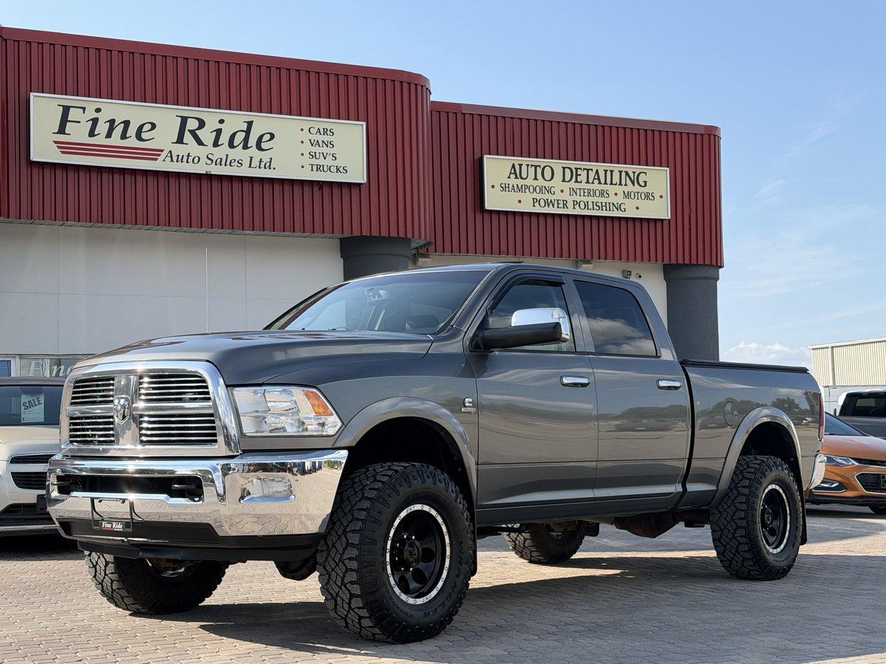<p>2012 Ram 2500 Laramie Crew Cab 4X4</p><p>6.7LTR Cummins diesel<br>A/C<br>Tilt<br>Cruise<br>Power windows<br>Power locks<br>Power mirrors<br>Power heated & air-conditioned seats<br>Power pedals<br>Heated steering wheel<br>AM/FM radio<br>Bluetooth<br>NAV<br>440,000kms!<br>Factory remote start<br>2.5 leveling kit<br>Spray in box liner<br>Tonneau cover<br>34 tires<br>Fully deleted with Bully Dog tuner<br>All factory exhaust to put back to stock will be supplied at time of purchase<br>Oil changes done EVERY 5,000kms!</p><p>GVW: 9,600LBS<br>Gear ratio: 3.73<br>Transmission: 6 speed, 68RFE<br>Towing: Approximately 12,900LBS</p><p>$24,975 Safetied</p><p>Consignment Sale</p><p>www.FineRideAutoSales.ca</p><p>Call: 204-415-3300 or 1-855-854-3300<br>Text: 204-226-1790<br>View in person at: Unit 3-3000 Main Street</p><p></p><p class=has-text-align-center has-medium-font-size wp-block-paragraph style=-webkit-text-stroke-width:0px;background-color:rgb(255, 255, 255);border-color:rgb(221, 222, 223);box-sizing:border-box;color:rgb(26, 26, 26);font-family:Roboto;font-size:20px !important;font-style:normal;font-variant-caps:normal;font-variant-ligatures:normal;font-weight:400;letter-spacing:normal;line-height:27.1328px;margin-block:0px 1.2em;orphans:2;text-align:center;text-decoration-color:initial;text-decoration-style:initial;text-decoration-thickness:initial;text-indent:0px;text-transform:none;white-space:normal;widows:2;word-spacing:0px;><em style=border-color:rgb(221, 222, 223);box-sizing:border-box;><i><strong style=border-color:rgb(221, 222, 223);box-sizing:border-box;>***NEW SUMMER HOURS EFFECTIVE MAY 15, 2026***</strong></i></em></p><p class=has-text-align-center has-medium-font-size wp-block-paragraph style=-webkit-text-stroke-width:0px;background-color:rgb(255, 255, 255);border-color:rgb(221, 222, 223);box-sizing:border-box;color:rgb(26, 26, 26);font-family:Roboto;font-size:20px !important;font-style:normal;font-variant-caps:normal;font-variant-ligatures:normal;font-weight:400;letter-spacing:normal;line-height:27.1328px;margin-block:0px;orphans:2;text-align:center;text-decoration-color:initial;text-decoration-style:initial;text-decoration-thickness:initial;text-indent:0px;text-transform:none;white-space:normal;widows:2;word-spacing:0px;>Monday                9am to 6pm<br>Tuesday               9am to 6pm<br>Wednesday               9am to 8pm<br>Thursday                9am to 6pm<br>Friday                9am to 6pm<br>Saturday                               CLOSED<br>Sunday                                 CLOSED</p>