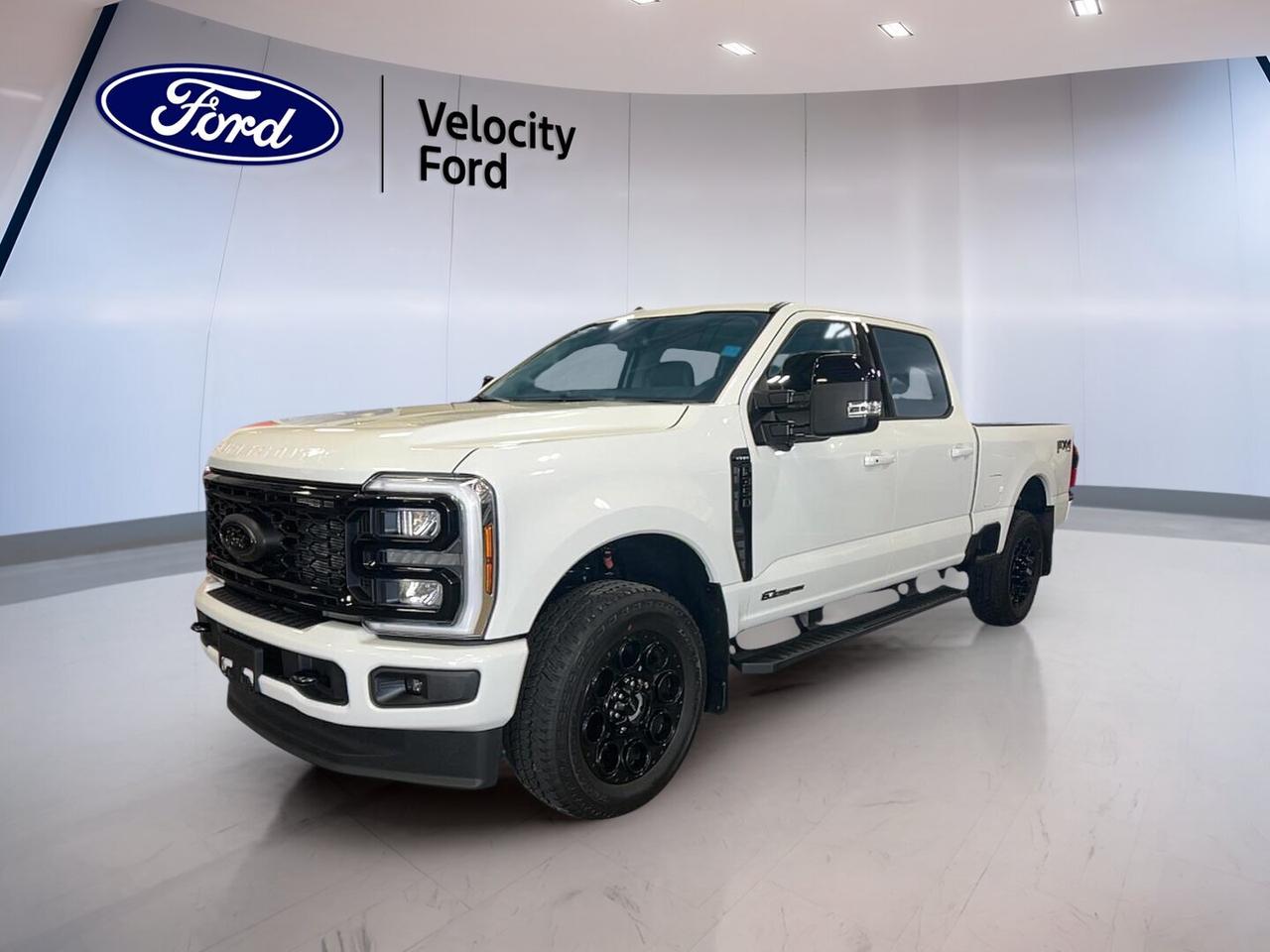 Built to handle hard work with confidence, this used 2026 Ford Super Duty F-350 SRW Lariat is ready for demanding jobs in Moose Jaw and beyond. With only 301 km on the odometer, a White exterior, and the proven 6.7 L Power Stroke V8 turbo diesel engine, this heavy-duty truck delivers serious capability.

At Velocity Ford, this 2026 Ford Super Duty F-350 SRW Lariat stands out for buyers who need strong diesel performance, a refined cabin, and trusted durability. The TORQSHIFT 10-speed automatic transmission helps deliver smooth power on the road, while the engine block heater adds welcome convenience for cold Canadian mornings.

FEATURES OF THE Super Duty F-350 SRW Lariat
»» Heavy-duty diesel power for demanding work
»» TORQSHIFT automatic supports smooth power delivery
»» White exterior gives clean professional presence
»» Low 301 km shows light use

TRUCK FEATURES
»» Built for towing and hauling confidence
»» Single rear wheel setup aids manoeuvrability
»» Strong chassis supports heavy-duty job needs
»» Diesel torque helps with loaded pulling

ADVANCED SAFETY FEATURES
»» Four-wheel disc brakes support controlled stopping
»» Trailer work benefits from stable chassis
»» Large truck design supports road visibility
»» Durable build adds everyday driving confidence

PERFORMANCE AND EFFICIENCY
»» 6.7 L turbo diesel V8 power
»» TORQSHIFT 10-speed automatic shifts smoothly
»» Diesel torque supports towing and hauling
»» Engine block heater helps winter starts

COMFORT AND CONVENIENCE
»» Spacious cabin suits long work days
»» Easy entry supports daily truck use
»» Refined ride for heavy-duty capability
»» Practical layout keeps controls within reach

TECHNOLOGY AND CONNECTIVITY
»» Clear driver information for daily operation
»» Modern controls support simple functionality
»» Easy access to key truck settings
»» Designed for work-focused driving convenience

CARGO SPACE
»» Pickup bed supports tools and equipment
»» Heavy-duty design suits demanding cargo needs
»» Bed area helps with jobsite versatility
»» Ample room for workday essentials

WHAT OTHER OWNERS LIKE
»» Strong diesel torque for serious pulling
»» Smooth automatic transmission under heavy loads
»» Comfortable cabin for long driving days
»» Tough build quality for hard work

This used 2026 Ford Super Duty F-350 SRW Lariat is a smart choice for drivers who want real heavy-duty strength without giving up comfort and usability. The 6.7 L Power Stroke turbo diesel is well known for delivering the kind of low-end torque truck owners want when towing, hauling, or travelling through tough prairie conditions.

The White exterior gives this truck a clean and professional look that fits well at the jobsite, on the farm, or in town. Its single rear wheel configuration also helps make everyday driving and parking easier than a dual rear wheel setup, while still offering the toughness expected from a Super Duty.

For buyers in Moose Jaw looking for a low-kilometre diesel truck with proven capability, this 2026 Ford Super Duty F-350 SRW Lariat offers a compelling mix of power, durability, and practical value. It is ready to get to work and ready to represent the strength drivers expect from Velocity Ford.

This 2026 Ford Super Duty F-350 SRW Lariats VIN is: 1FT8W3BT4TEF02043.