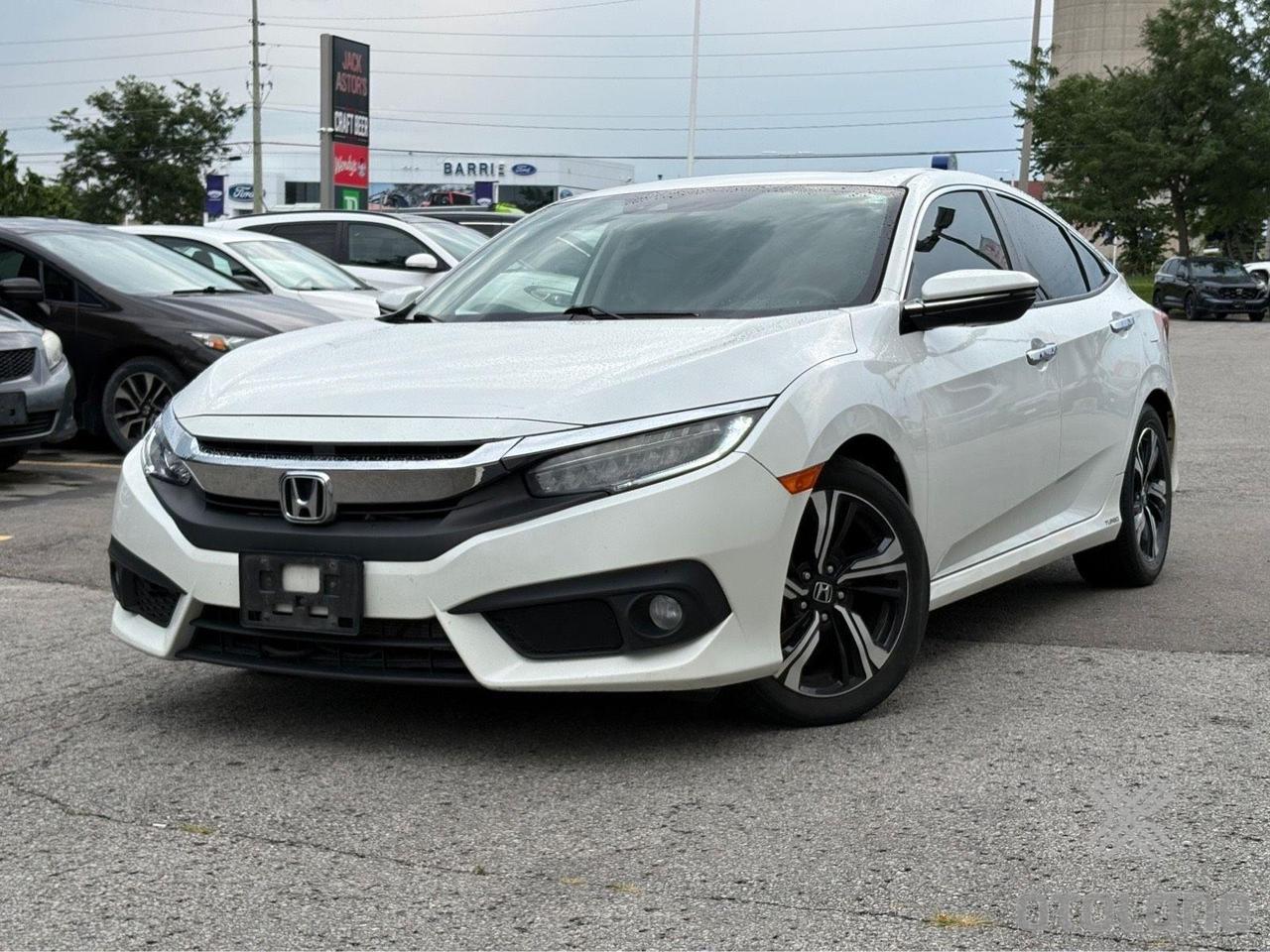 <h2 role=heading data-sfc-cp= data-sfc-root=ep>2017 Honda Civic Touring &ndash; $12,999 (+ HST & Licensing)<!--TgQPHd|||[]--></h2><div data-sfc-cp= data-sfc-root=ep><span data-sfc-cp= data-sfc-root=ep>CLEAN CARFAX - NO ACCIDENTS | Top-Tier Touring Trim | Fully Loaded Fuel Saver<!--TgQPHd|||[]--></span> 🏆⚪<!--TgQPHd|||[]--></div><div data-sfc-cp= data-sfc-root=ep>🔥 <span data-sfc-cp= data-sfc-root=ep>The Best Perks<!--TgQPHd|||[]--></span><!--TgQPHd|||[]--></div><div data-sfc-cp= data-sfc-root=ep><ul><li data-sfc-cp= data-sfc-root=ep>🎁&nbsp;<span data-sfc-cp= data-sfc-root=ep>FREE<!--TgQPHd|||[]--></span> Professional Rust Proofing included!<!--TgQPHd|||[]--></li><li data-sfc-cp= data-sfc-root=ep>🎁 <span data-sfc-cp= data-sfc-root=ep>FREE<!--TgQPHd|||[]--></span> Fresh Oil Change included!<!--TgQPHd|||[]--></li></ul><!--TgQPHd|||[]--></div><div data-sfc-cp= data-sfc-root=ep>💰 <span data-sfc-cp= data-sfc-root=ep>UNBEATABLE VALUE:<!--TgQPHd|||[]--></span><!--TgQPHd|||[]--></div><div data-sfc-cp= data-sfc-root=ep><ul><li data-sfc-cp= data-sfc-root=ep><span data-sfc-cp= data-sfc-root=ep>Price:<!--TgQPHd|||[]--></span> $12,999 + HST & Licensing<!--TgQPHd|||[]--></li><li data-sfc-cp= data-sfc-root=ep><span data-sfc-cp= data-sfc-root=ep>Safety Certification:<!--TgQPHd|||[]--></span> Available for an extra $599<!--TgQPHd|||[]--></li><li data-sfc-cp= data-sfc-root=ep><span data-sfc-cp= data-sfc-root=ep>Warranty:<!--TgQPHd|||[]--></span> 6-Month Engine & Transmission cover for only $299!<!--TgQPHd|||[]--></li></ul><!--TgQPHd|||[]--></div><div data-sfc-cp= data-sfc-root=ep>📅 <span data-sfc-cp= data-sfc-root=ep>VIEWING BY APPOINTMENT ONLY<!--TgQPHd|||[]--></span><br data-sfc-root=ep data-sfc-pl=|||[]>📞 <span data-sfc-cp= data-sfc-root=ep>CALL/TEXT KAPIL:<!--TgQPHd|||[]--></span> 437-766-1844<br data-sfc-root=ep data-sfc-pl=|||[]>📍 <span data-sfc-cp= data-sfc-root=ep>LOCATION:<!--TgQPHd|||[]--></span> 9074 Wellington Rd 124, Hillsburgh, ON<!--TgQPHd|||[]--></div><div data-sfc-cp= data-sfc-root=ep><ul><li data-sfc-cp= data-sfc-root=ep><span data-sfc-cp= data-sfc-root=ep>Mileage:<!--TgQPHd|||[]--></span> 150,035 km<!--TgQPHd|||[]--></li><li data-sfc-cp= data-sfc-root=ep><span data-sfc-cp= data-sfc-root=ep>Accident History:<!--TgQPHd|||[]--></span> Clean Profile &ndash; No Accidents!<!--TgQPHd|||[]--></li><li data-sfc-cp= data-sfc-root=ep>⚖️&nbsp;<span data-sfc-cp= data-sfc-root=ep>OMVIC Disclaimer:</span></li></ul></div><div data-sfc-cp= data-sfc-root=ep><em data-sfc-root=ep>Note: Since we offer this vehicle at a rock-bottom wholesale price before safety, OMVIC regulations require us to include this standard legal statement:<!--TgQPHd|||[]--></em><!--TgQPHd|||[]--></div><div data-sfc-cp= data-sfc-root=ep><span data-sfc-cp= data-sfc-root=ep>OMVIC Mandatory Disclosure:<!--TgQPHd|||[]--></span> This vehicle is being sold as-is, unfit, not e-tested and is not represented as being in road worthy condition, mechanically sound or maintained at any guaranteed level of quality. The vehicle may not be fit for use as a means of transportation and may require substantial repairs at the purchaser&rsquo;s expense. It may not be possible to register the vehicle to be driven in its current condition.<!--TgQPHd|||[]--></div><div data-sfc-root=ep><!--TgQPHd|||[]--></div><div data-sfc-root=ep><!--TgQPHd|||[]--></div>