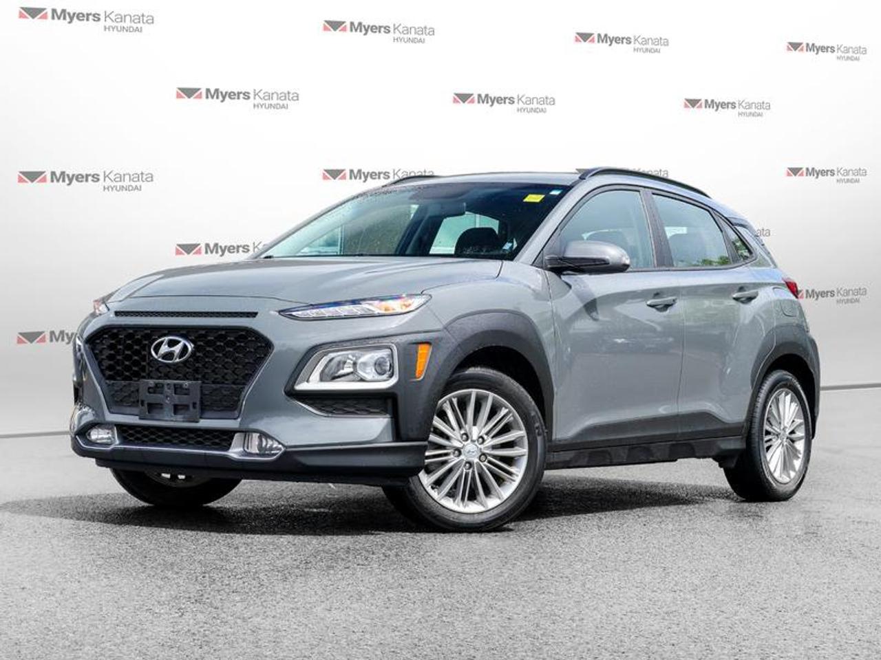 <b>Blind Spot Detection,  Heated Steering Wheel,  Heated Seats,  Aluminum Wheels,  Remote Keyless Entry!</b><br> <br> A different breed of SUV designed to take on the city, introducing the 2021 Hyundai KONA! This 2021 Hyundai Kona is fresh on our lot in Kanata.<br> <br>The KONA has been designed to turn heads - and to raise pulses. The dynamic design catches your eye with unique details that highlight the strong Hyundai SUV DNA at its core, starting with our signature cascading front grille design, muscular wheel arches and advanced lighting. Bold accent body panels run along the side and rear bumper for a sporty look. Step inside and instantly experience an exceptional level of comfort thanks to its wealth of features. This Kona is more than just its trendy appearance, its a real urban warrior.<br> <br>This SUV has 67,302 km. Its Gray in colour and is completely accident free based on the <a href=https://vhr.carfax.ca/?id=Uz2YfZtiA5Q0G40N5rnlIYCnNot2nSF0 target=_blank>CARFAX Report</a>. It has an Automatic transmission and is powered by a 147HP 2.0L 4 Cylinder Engine. <br> <br> Our Konas trim level is 2.0L Preferred AWD. This all wheel drive Kona Preferred adds a leather heated steering wheel, blind spot detection with rear cross traffic collision warning, larger aluminum wheels and a proximity key for easy push button starts. You will also get heated front seats, Apple CarPlay, Android Auto, a rear view camera, bluetooth streaming audio, a 60/40 split rear seat, cruise control and much more. This vehicle has been upgraded with the following features: Blind Spot Detection, Heated Steering Wheel, Heated Seats, Aluminum Wheels, Remote Keyless Entry, Apple CarPlay, Android Auto.<br> <br>To apply right now for financing use this link: <a href=https://www.myerskanatahyundai.com/finance/ target=_blank>https://www.myerskanatahyundai.com/finance/</a><br> <br/>Buy this vehicle now for the lowest weekly payment of <b>$67.79</b> with $0 down for 96 months @ 8.99% APR O.A.C. ( Plus applicable taxes - and licensing fees ). See dealer for details. <br><br>Smart buyers buy at Myers where all cars come Myers Certified including a 1 year tire and road hazard warranty (some conditions apply, see dealer for full details.)<br> <br>This vehicle is located at Myers Kanata Hyundai 400-2500 Palladium Dr Kanata, Ontario.<br>*LIFETIME ENGINE TRANSMISSION WARRANTY NOT AVAILABLE ON VEHICLES WITH KMS EXCEEDING 140,000KM, VEHICLES 8 YEARS & OLDER, OR HIGHLINE BRAND VEHICLE(eg. BMW, INFINITI. CADILLAC, LEXUS...)<br> Come by and check out our fleet of 40+ used cars and trucks and 170+ new cars and trucks for sale in Kanata.  o~o