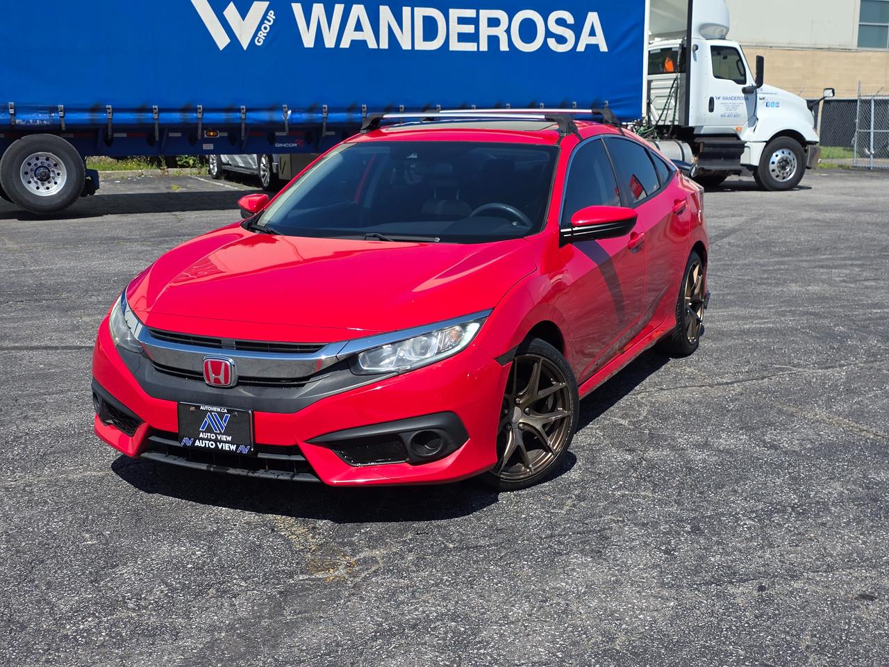 <p dir=ltr>JUST ARRIVED!!</p><p dir=ltr>2018 Honda Civic EX</p><p dir=ltr>GREAT BACK TO SCHOOL CAR!!</p><p dir=ltr>The 2018 Honda Civic EX is a popular compact car featuring a 2.0-liter 4-cylinder engine, a smooth CVT automatic transmission, a 7-inch touch screen with Apple CarPlay and Android Auto, a power moonroof, and Honda Sensing safety tech.</p><p dir=ltr><strong>Key Specifications:</strong></p><p dir=ltr><strong>Engine: </strong>2.0L 4-cylinder</p><p dir=ltr><strong>Horsepower: </strong>158 hp</p><p dir=ltr><strong>Transmission: </strong>Continuously Variable Transmission (CVT)</p><p dir=ltr><strong>Fuel Economy: </strong>Approx. 7.3 L/100 km combined (32 mpg city / 42 mpg highway depending on testing standards)</p><p dir=ltr><strong>Cargo Space: </strong>428 liters (15.1 cu. ft.)</p><p dir=ltr><strong>Main Features:</strong></p><p dir=ltr><strong>Technology:</strong> 7-inch display audio touchscreen, smartphone integration, and smart entry with push-button start.</p><p dir=ltr><strong>Comfort: </strong>Dual-zone automatic climate control, power moonroof, and remote engine start.</p><p dir=ltr><strong>Safety: </strong>Honda Sensing suite (adaptive cruise control, lane keeping assist, and collision mitigation braking) plus a multi-angle rearview camera.</p><p dir=ltr><strong>Exterior: </strong>16-inch alloy wheels and heated power door mirrors.</p><p dir=ltr style=line-height: 1.2; margin-top: 12pt; margin-bottom: 12pt;>&nbsp;</p><p dir=ltr style=line-height: 1.2; margin-top: 12pt; margin-bottom: 12pt;><span style=font-size: 11pt; font-family: Roboto,sans-serif; color: #000000; background-color: transparent; font-weight: 400; font-style: italic; font-variant: normal; text-decoration: none; vertical-align: baseline; white-space: pre-wrap;>**VEHICLE BEING SOLD ON CONSIGNMENT** </span></p><p dir=ltr style=line-height: 1.2; margin-top: 12pt; margin-bottom: 12pt;><span style=font-size: 11pt; font-family: Roboto,sans-serif; color: #000000; background-color: transparent; font-weight: 400; font-style: italic; font-variant: normal; text-decoration: none; vertical-align: baseline; white-space: pre-wrap;>FINANCING AND LEASING AVAILABLE ON ALL CERTIFIED VEHICLES.</span></p><p dir=ltr style=line-height: 1.2; margin-top: 12pt; margin-bottom: 12pt;><span style=font-size: 11pt; font-family: Roboto,sans-serif; color: #000000; background-color: transparent; font-weight: 400; font-style: italic; font-variant: normal; text-decoration: none; vertical-align: baseline; white-space: pre-wrap;>HST and Licensing Fees are to be charged on all vehicles.&nbsp;</span></p><p dir=ltr style=line-height: 1.2; margin-top: 12pt; margin-bottom: 12pt;><span style=font-size: 11pt; font-family: Roboto,sans-serif; color: #000000; background-color: transparent; font-weight: 400; font-style: italic; font-variant: normal; text-decoration: none; vertical-align: baseline; white-space: pre-wrap;>All CERTIFIED vehicles come with a 36-day Safety Guarantee.</span></p><p dir=ltr style=line-height: 1.2; margin-top: 12pt; margin-bottom: 12pt;><span style=font-size: 11pt; font-family: Roboto,sans-serif; color: #000000; background-color: transparent; font-weight: 400; font-style: italic; font-variant: normal; text-decoration: none; vertical-align: baseline; white-space: pre-wrap;>ALL CERTIFIED VEHICLES COME WITH A BRONZE GLOBAL WARRANTY (3 MONTH / 3,000 KM / $1,000 PER CLAIM)</span></p><p dir=ltr style=line-height: 1.2; margin-top: 12pt; margin-bottom: 12pt;><span style=font-size: 11pt; font-family: Roboto,sans-serif; color: #000000; background-color: transparent; font-weight: 400; font-style: italic; font-variant: normal; text-decoration: none; vertical-align: baseline; white-space: pre-wrap;>EXTENDED GLOBAL WARRANTY OPTIONS AVAILABLE ON ALL CERTIFIED VEHICLES.</span></p><p dir=ltr style=line-height: 1.2; margin-top: 12pt; margin-bottom: 12pt;><span style=font-size: 11pt; font-family: Roboto,sans-serif; color: #000000; background-color: transparent; font-weight: 400; font-style: italic; font-variant: normal; text-decoration: none; vertical-align: baseline; white-space: pre-wrap;>Auto View is located at 590 South Service Road Stoney Creek, only minutes off the QEW Exit 83 Fruitland Road!</span></p><p dir=ltr style=line-height: 1.2; margin-top: 12pt; margin-bottom: 12pt;><span style=font-size: 11pt; font-family: Roboto,sans-serif; color: #000000; background-color: transparent; font-weight: 400; font-style: italic; font-variant: normal; text-decoration: none; vertical-align: baseline; white-space: pre-wrap;>Contact us VIA email, call, or text!</span></p><p dir=ltr style=line-height: 1.2; margin-top: 12pt; margin-bottom: 12pt;><span style=font-size: 11pt; font-family: Roboto,sans-serif; color: #000000; background-color: transparent; font-weight: 400; font-style: italic; font-variant: normal; text-decoration: none; vertical-align: baseline; white-space: pre-wrap;>sales@autoview.ca</span></p><p style=line-height: 1.2;><span id=docs-internal-guid-dc6619b1-7fff-14fb-1847-6df547af7f68></span></p><p dir=ltr style=line-height: 1.2; margin-top: 12pt; margin-bottom: 12pt;><span style=font-size: 11pt; font-family: Roboto,sans-serif; color: #000000; background-color: transparent; font-weight: 400; font-style: italic; font-variant: normal; text-decoration: none; vertical-align: baseline; white-space: pre-wrap;>905-379-4206</span></p>