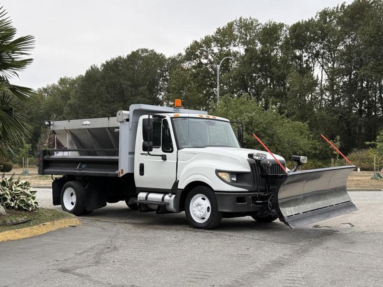 This 2012 International TerraStar is powered by a 6.4L V8 diesel engine paired with an automatic transmission and rear-wheel drive. Configured as a dump, sander, and plow truck, it is equipped for snow and ice control, road maintenance, municipal, property maintenance, and commercial applications.

The truck is equipped with a Henderson 9-foot snow plow and in-cab plow controls. A Henderson 10-foot sander/spreader is mounted within the dump body, providing material spreading capability for winter road and property maintenance. The truck is also equipped with PTO operation to support its work equipment.

Additional equipment includes hydraulic brakes, a backup camera, air-ride drivers seat, and air conditioning and heat.

Overall transport dimensions are approximately 27 feet 6 inches long, 9 feet wide, and 8 feet 8 inches high.

Finished in white with a gray vinyl interior, this International TerraStar combines dump-body versatility with dedicated plowing and material-spreading equipment in a purpose-built winter maintenance truck. This item is currently OFFSITE. You must register an appointment with our office to schedule an offsite viewing. Appointments must be made a minimum of one business day in advance (and as defined by the days that Repo.com is open for business) before your appointment can be scheduled and confirmed. We may, at our own discretion, instead opt to transport smaller items to Repo.coms main yard for viewing purposes.  $59,880.00 plus $375 processing fee, $60,255.00 total payment obligation before taxes.   Listing report, warranty, contract commitment cancellation fee. All above specifications and information is considered to be accurate but is not guaranteed and no opinion or advice is given as to whether this item should be purchased. We do not allow test drives due to theft, fraud, acts of vandalism and undetectable impaired driving. Instead we provide the following benefits: Complimentary Warranty (with options to extend), Limited Money Back Satisfaction Guarantee on Fully Completed Contracts, Contract Commitment Cancellation, and an Open-Ended Sell-Back Option. Ask seller for details or call 604-522-REPO(7376) to confirm listing availability.