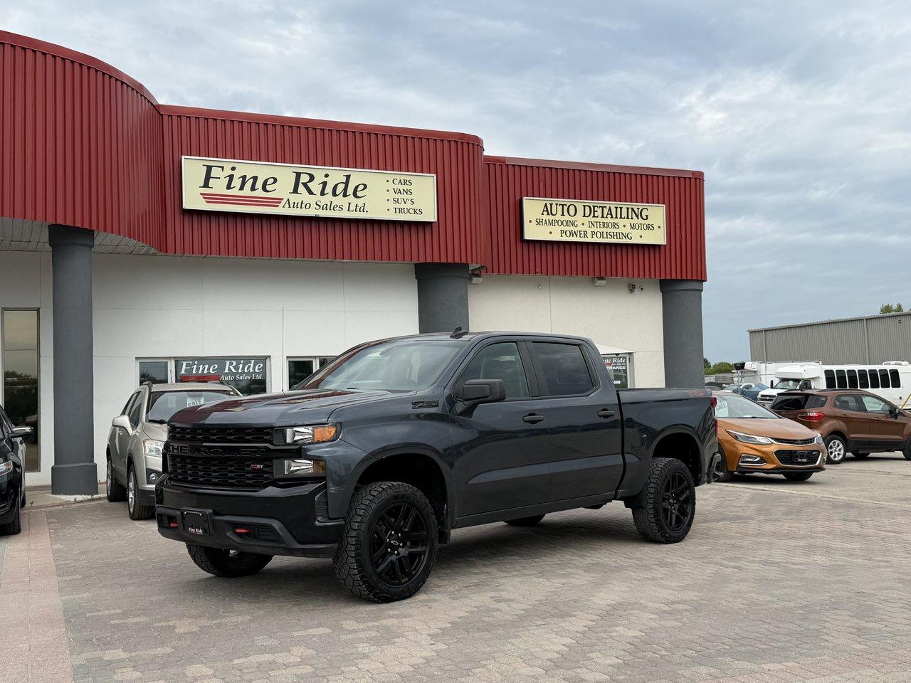 <p>2021 Chevrolet Silverado 1500 Custom Trail Boss Crew Cab Z71</p><p>5.3LTR V8<br>A/C<br>Telescopic tilt steering<br>Cruise<br>Power windows<br>Power locks<br>Power mirrors<br>6 passengers<br>AM/FM radio<br>MY CHEVROLET  /  Bluetooth  /  WI-FI<br>USB & USB-C port<br>174,000kms!<br>Factory remote start<br>Power tail gate<br>Back up camera<br>5.5ft box<br>20 rims<br>Manitoba & Saskatchewan truck!</p><p>GVW: 7,000LBS<br>Gear: 3.42<br>Transmission: 6 speed, 6L-80<br>Towing: Approximately 9,400LBS</p><p>$26,975 Safetied<br>Financing and Warranty Available at Fine Ride Auto Sales Ltd<br>www.FineRideAutoSales.ca</p><p>Call: 204-415-3300 or 1-855-854-3300<br>Text: 204-226-1790<br>View in person at: Unit 3-3000 Main Street</p><p>DLR# 4614<br>**Plus applicable taxes**</p><p></p><p style=-webkit-text-stroke-width:0px;background-color:rgb(255, 255, 255);border-color:rgb(221, 222, 223);box-sizing:border-box;color:rgb(26, 26, 26);font-family:Roboto;font-size:18px;font-style:normal;font-variant-caps:normal;font-variant-ligatures:normal;font-weight:400;letter-spacing:normal;line-height:25.0195px;margin-block:0px 1.2em;orphans:2;text-align:center;text-decoration-color:initial;text-decoration-style:initial;text-decoration-thickness:initial;text-indent:0px;text-transform:none;white-space:normal;widows:2;word-spacing:0px;><span style=color:rgb(0,0,0);><em style=border-color:rgb(221, 222, 223);box-sizing:border-box;><i><span style=border-color:rgb(221, 222, 223);box-sizing:border-box;display:block;font-family:book antiqua, palatino, serif;font-size:14pt;><strong style=border-color:rgb(221, 222, 223);box-sizing:border-box;>***NEW SUMMER HOURS EFFECTIVE MAY 15, 2026***</strong></span></i></em></span></p><p style=-webkit-text-stroke-width:0px;background-color:rgb(255, 255, 255);border-color:rgb(221, 222, 223);box-sizing:border-box;color:rgb(26, 26, 26);font-family:Roboto;font-size:18px;font-style:normal;font-variant-caps:normal;font-variant-ligatures:normal;font-weight:400;letter-spacing:normal;line-height:25.0195px;margin-block:0px;orphans:2;text-align:center;text-decoration-color:initial;text-decoration-style:initial;text-decoration-thickness:initial;text-indent:0px;text-transform:none;white-space:normal;widows:2;word-spacing:0px;><span style=color:rgb(0,0,0);><span style=border-color:rgb(221, 222, 223);box-sizing:border-box;display:block;font-family:book antiqua, palatino, serif;font-size:14pt;>Monday                9am to 6pm</span></span></p><p style=-webkit-text-stroke-width:0px;background-color:rgb(255, 255, 255);border-color:rgb(221, 222, 223);box-sizing:border-box;color:rgb(26, 26, 26);font-family:Roboto;font-size:18px;font-style:normal;font-variant-caps:normal;font-variant-ligatures:normal;font-weight:400;letter-spacing:normal;line-height:25.0195px;margin-block:0px;orphans:2;text-align:center;text-decoration-color:initial;text-decoration-style:initial;text-decoration-thickness:initial;text-indent:0px;text-transform:none;white-space:normal;widows:2;word-spacing:0px;><span style=color:rgb(0,0,0);><span style=border-color:rgb(221, 222, 223);box-sizing:border-box;display:block;font-family:book antiqua, palatino, serif;font-size:14pt;>Tuesday               9am to 6pm</span></span></p><p style=-webkit-text-stroke-width:0px;background-color:rgb(255, 255, 255);border-color:rgb(221, 222, 223);box-sizing:border-box;color:rgb(26, 26, 26);font-family:Roboto;font-size:18px;font-style:normal;font-variant-caps:normal;font-variant-ligatures:normal;font-weight:400;letter-spacing:normal;line-height:25.0195px;margin-block:0px;orphans:2;text-align:center;text-decoration-color:initial;text-decoration-style:initial;text-decoration-thickness:initial;text-indent:0px;text-transform:none;white-space:normal;widows:2;word-spacing:0px;><span style=color:rgb(0,0,0);><span style=border-color:rgb(221, 222, 223);box-sizing:border-box;display:block;font-family:book antiqua, palatino, serif;font-size:14pt;>Wednesday               9am to 8pm</span></span></p><p style=-webkit-text-stroke-width:0px;background-color:rgb(255, 255, 255);border-color:rgb(221, 222, 223);box-sizing:border-box;color:rgb(26, 26, 26);font-family:Roboto;font-size:18px;font-style:normal;font-variant-caps:normal;font-variant-ligatures:normal;font-weight:400;letter-spacing:normal;line-height:25.0195px;margin-block:0px;orphans:2;text-align:center;text-decoration-color:initial;text-decoration-style:initial;text-decoration-thickness:initial;text-indent:0px;text-transform:none;white-space:normal;widows:2;word-spacing:0px;><span style=color:rgb(0,0,0);><span style=border-color:rgb(221, 222, 223);box-sizing:border-box;display:block;font-family:book antiqua, palatino, serif;font-size:14pt;>Thursday                9am to 6pm</span></span></p><p style=-webkit-text-stroke-width:0px;background-color:rgb(255, 255, 255);border-color:rgb(221, 222, 223);box-sizing:border-box;color:rgb(26, 26, 26);font-family:Roboto;font-size:18px;font-style:normal;font-variant-caps:normal;font-variant-ligatures:normal;font-weight:400;letter-spacing:normal;line-height:25.0195px;margin-block:0px;orphans:2;text-align:center;text-decoration-color:initial;text-decoration-style:initial;text-decoration-thickness:initial;text-indent:0px;text-transform:none;white-space:normal;widows:2;word-spacing:0px;><span style=color:rgb(0,0,0);><span style=border-color:rgb(221, 222, 223);box-sizing:border-box;display:block;font-family:book antiqua, palatino, serif;font-size:14pt;>Friday                9am to 6pm</span></span></p><p style=-webkit-text-stroke-width:0px;background-color:rgb(255, 255, 255);border-color:rgb(221, 222, 223);box-sizing:border-box;color:rgb(26, 26, 26);font-family:Roboto;font-size:18px;font-style:normal;font-variant-caps:normal;font-variant-ligatures:normal;font-weight:400;letter-spacing:normal;line-height:25.0195px;margin-block:0px;orphans:2;text-align:center;text-decoration-color:initial;text-decoration-style:initial;text-decoration-thickness:initial;text-indent:0px;text-transform:none;white-space:normal;widows:2;word-spacing:0px;><span style=color:rgb(0,0,0);><span style=border-color:rgb(221, 222, 223);box-sizing:border-box;display:block;font-family:book antiqua, palatino, serif;font-size:14pt;>Saturday                               CLOSED</span></span></p><p style=-webkit-text-stroke-width:0px;background-color:rgb(255, 255, 255);border-color:rgb(221, 222, 223);box-sizing:border-box;color:rgb(26, 26, 26);font-family:Roboto;font-size:18px;font-style:normal;font-variant-caps:normal;font-variant-ligatures:normal;font-weight:400;letter-spacing:normal;line-height:25.0195px;margin-block:0px;orphans:2;text-align:center;text-decoration-color:initial;text-decoration-style:initial;text-decoration-thickness:initial;text-indent:0px;text-transform:none;white-space:normal;widows:2;word-spacing:0px;><span style=color:rgb(0,0,0);><span style=border-color:rgb(221, 222, 223);box-sizing:border-box;display:block;font-family:book antiqua, palatino, serif;font-size:14pt;>Sunday                                 CLOSED</span></span></p>