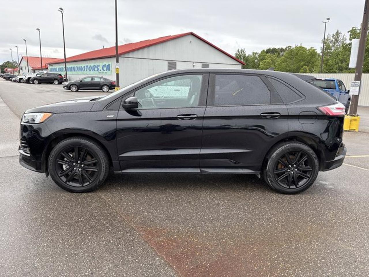 // ACCIDENT FREE!! //<br /><br />This 2022 Ford Edge ST Line AWD is a sharp, well-equipped SUV that blends confident all-weather traction, everyday comfort, and modern technology in one stylish package. Finished in Black with a Black interior, this accident-free Ford Edge ST Line AWD offers sporty character, practical space, and a smooth automatic driving experience.<br /><br />With 110,285 km on the odometer, this used 2022 Ford Edge ST Line AWD remains a smart choice for drivers who want utility without giving up refinement. Its 2.0-litre gas engine, 8-speed automatic transmission, and 4-door layout make it easy to enjoy on daily commutes, family trips, and weekend travel around Cayuga.<br /><br />FEATURES OF THE Edge ST Line AWD | No Accidents | Pano. Sunroof | Heated Steering<br /><br />   Panoramic sunroof adds open-air cabin feel<br />   Heated steering wheel for cold mornings<br />   All-wheel drive for year-round confidence<br />   Sport-inspired ST-Line styling and presence<br /><br />ADVANCED SAFETY FEATURES<br /><br />   Backup camera helps with reversing visibility<br />   Blind spot monitor adds lane-change confidence<br />   Lane departure warning supports safer travel<br />   Multiple airbags enhance occupant protection<br /><br />PERFORMANCE AND EFFICIENCY<br /><br />   2.0-litre gas engine balances power efficiently<br />   8-speed automatic delivers smooth shifting<br />   All-wheel drive improves traction year-round<br />   Limited slip differential aids road grip<br /><br />COMFORT AND CONVENIENCE<br /><br />   Heated front seats boost winter comfort<br />   Dual-zone climate control keeps peace<br />   Remote starter adds everyday convenience<br />   Power liftgate eases cargo access<br /><br />TECHNONOLGY AND CONNECTIVITY<br /><br />   Apple CarPlay keeps apps within reach<br />   Android Auto supports easy smartphone access<br />   Bluetooth integration enables hands-free calling<br />   Navigation system helps guide every trip<br /><br />CARGO SPACE<br /><br />   Rear trunk access makes loading easier<br />   Power liftgate helps with busy days<br />   Four-door design improves passenger entry<br />   Versatile SUV layout supports daily hauling<br /><br />AWARDS & RECOGNITIONS<br /><br />   Top Safety Pick, Insurance Institute for Highway Safety, 2022<br /><br />WHAT OTHER OWNERS LIKE<br /><br />   Comfortable ride quality for daily driving<br />   User-friendly infotainment and phone integration<br />   Spacious cabin for passengers and gear<br />   Confident all-wheel drive in poor weather<br /><br />Inside, this 2022 Ford Edge ST Line AWD is built to make every drive feel easy and connected. You get heated front seats, a heated steering wheel, dual-zone automatic climate control, power driver and passenger seating, lumbar support, ambient lighting, and a panoramic sunroof that brings more light into the cabin.<br /><br />This 2022 Ford Edge ST Line AWD also delivers the technology drivers want most. Apple CarPlay, Android Auto, Bluetooth integration, WiFi hotspot capability, satellite radio, steering wheel audio controls, and a navigation system work together to keep you informed, entertained, and connected wherever the road leads.<br /><br />On the outside, this 2022 Ford Edge ST Line AWD has a clean, athletic look enhanced by its Black finish, rear spoiler, fog lights, LED headlamps, tinted windows, heated mirrors, and power mirrors. Automatic headlights and a power liftgate add extra convenience to your day-to-day routine.<br /><br />Driver-assist and safety features help make this 2022 Ford Edge ST Line AWD an easy SUV to trust. Adaptive cruise control, blind spot monitoring, lane departure warning, a backup camera, anti-lock brakes, stability control, tire pressure monitoring, child safety locks, and automatic door locks all support greater peace of mind.<br /><br />Sold by Haldimand Motors Ltd. in Cayuga, this accident-free 2022 Ford Edge ST Line AWD stands out for its balanced mix of sporty design, useful features, and year-round capability. If you want a midsize SUV with comfort, smart technology, and confident AWD performance, this Ford Edge deserves a close look.<br /><br />This 2022 Ford Edge ST Line AWD | No Accidents | Pano. Sunroof | Heated Steerings VIN is: 2FMPK4J92NBA42345.<br /><br />WHY CHOOSE US? <br /><br />Honest & Transparent Buying Experience: Weve been a trusted name in business since 1984.<br /><br />STRAIGHTFORWARD PRICING:<br />Our Advertised Price Includes:<br />>>Safety Certification (No separate fee!)<br />>>30-Day 100% Mechanical Warranty<br />>>FREE Carfax History Report.<br />>>No upcharge for paying cash.<br />(Prices Exclude HST and Licensing Fees only.)<br /><br />>>Browse 300+ vehicles all in ONE LOCATION<br /><br />EASY FINANCING: Great rates & open loans<br /><br />WE BUY CARS: Get Top Dollar for your trade-in, or sell us your vehicle for CASH! Even if you dont buy from us!<br /><br />STOP BY TODAY<br />Treat yourself - stop by Haldimand Motors Ltd. located at 42 Talbot St E, Cayuga, ON N0A 1E0 to make this car yours today!<br /><br />https://www.haldimandmotors.com/used/stock-461174.html