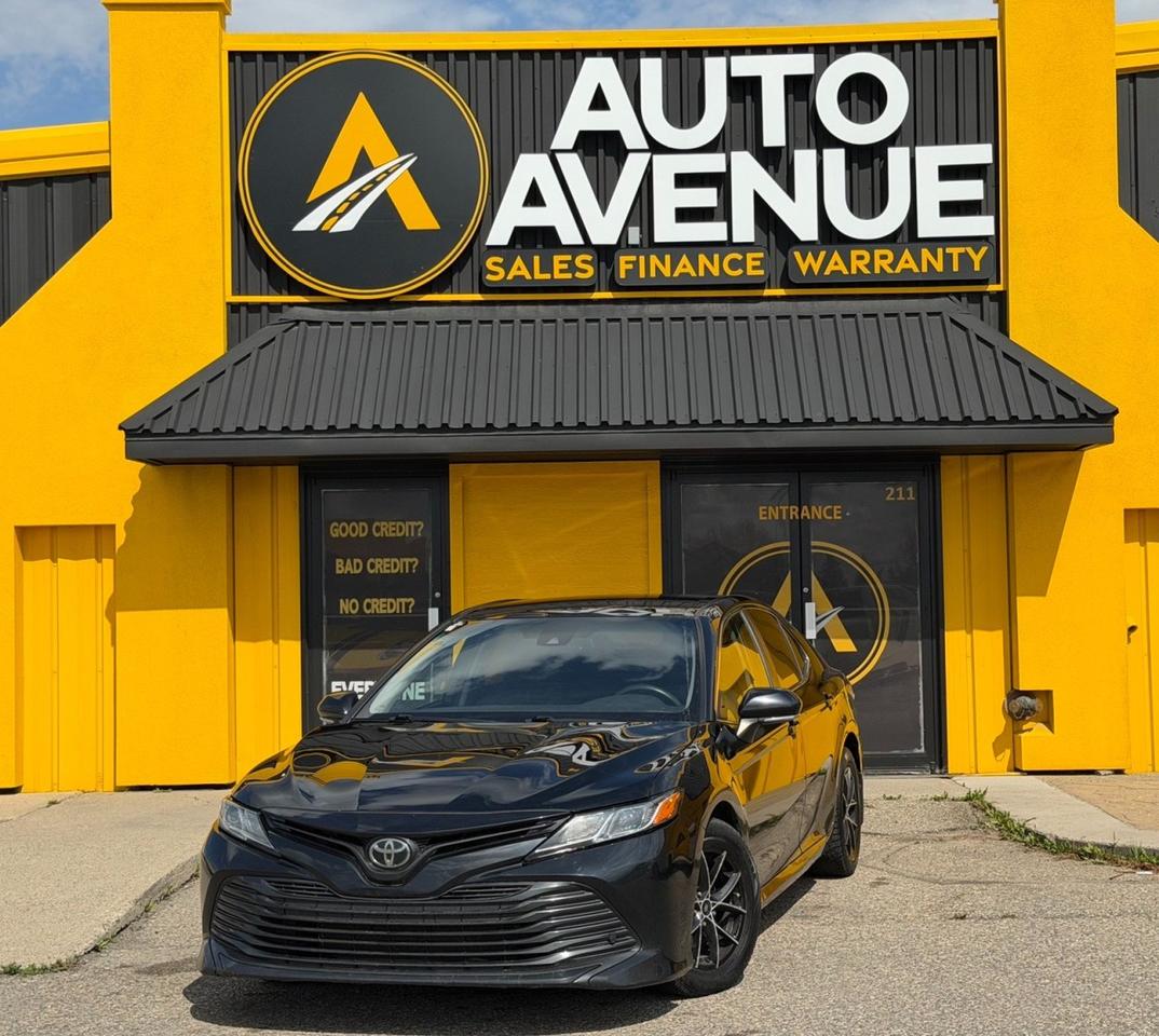 This outstanding example of a 2019 Toyota Camry SE is proudly offered by Auto Avenue Airdrie. <br/> This exceptional sedan perfectly combines refined styling, impressive comfort, and Toyotas legendary reputation for quality and reliability. The Camry SE delivers a confident and engaging driving experience while maintaining the practicality and everyday comfort that make the Camry such a popular choice. <br/> Inside, youll find thoughtful features designed to make every drive more enjoyable, including heated seats and a convenient backup camera for added comfort, convenience, and confidence behind the wheel. With its sporty SE styling and proven Toyota engineering, this Camry stands out as a vehicle that looks as good as it performs. <br/> A perfect balance of style, reliability, and character - this Toyota Camry SE is more than just a sedan. Its the vehicle youve been looking for! <br/> AUTO AVENUE IS AN AMVIC LICENSED DEALERSHIP, COMMITTED TO PROVIDING EXCEPTIONAL SERVICE AND QUALITY VEHICLES WITH FLEXIBLE PAYMENT OPTIONS. <br/>