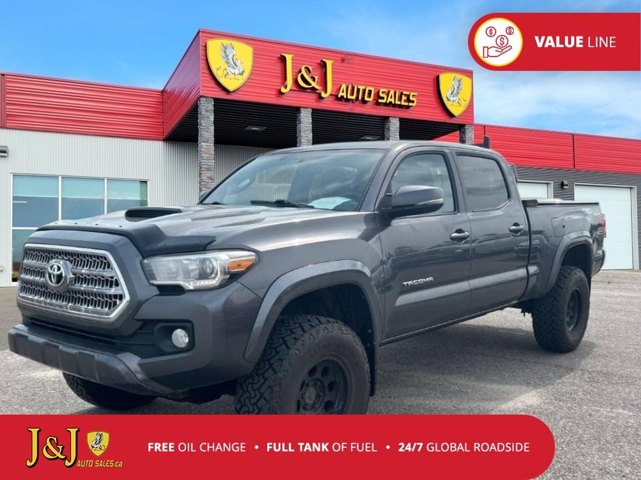 Awards:<br>  * 2016 KBB.com Best Resale Value Awards   * 2016 KBB.com Best Buy Awards Finalist New Price! Gray 2016 Toyota Tacoma SR5 4WD 6-Speed Automatic 3.5L V6 DOHC 24V LEV3-ULEV70 278hp Welcome to our dealership, where we cater to every car shoppers needs with our diverse range of vehicles. Whether youre seeking peace of mind with our meticulously inspected and Certified Pre-Owned vehicles, looking for great value with our carefully selected Value Line options, or are a hands-on enthusiast ready to tackle a project with our As-Is mechanic specials, weve got something for everyone. At our dealership, quality, affordability, and variety come together to ensure that every customer drives away satisfied. Experience the difference and find your perfect match with us today.<br><br>4WD.