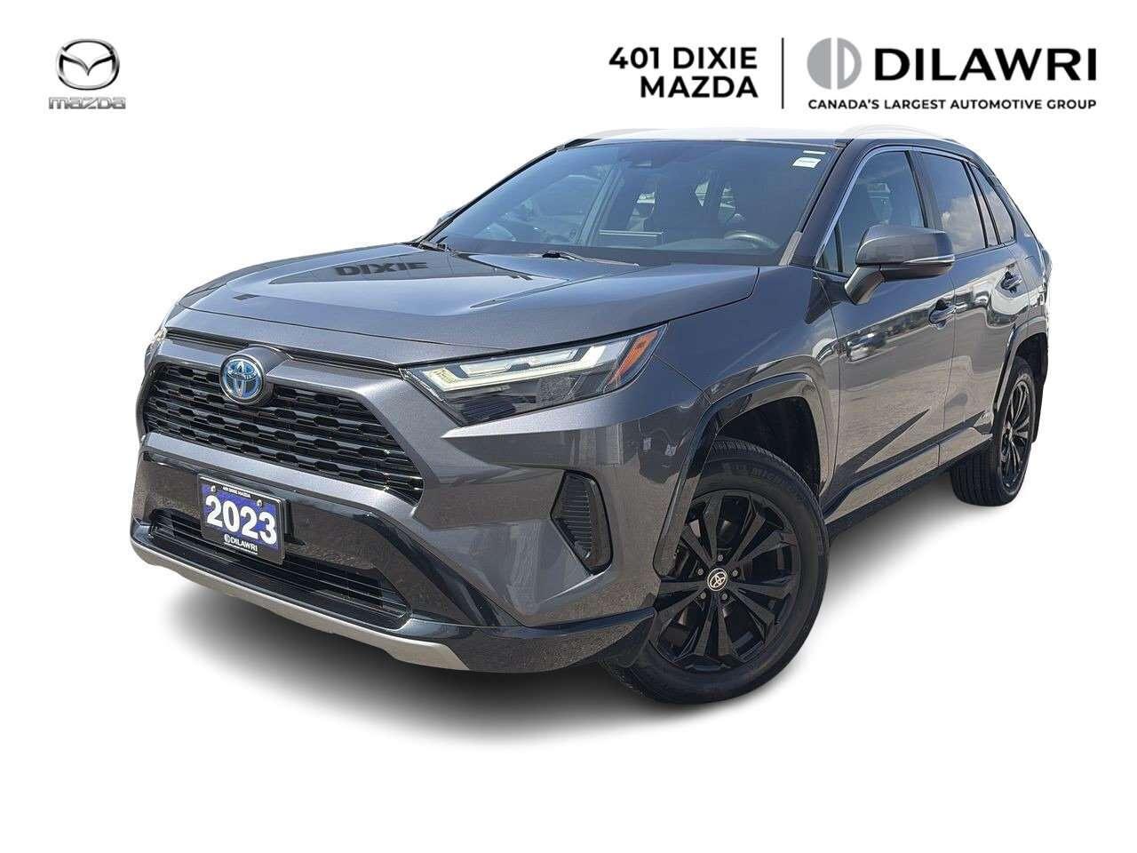 <hr /><p><strong>401 Dixie Mazda</strong></p><p>2.5L 4-CYLINDER HYBRID | 219 HP | ELECTRONIC ON-DEMAND AWD | e-CVT AUTOMATIC | ONE OWNER | CLEAN CARFAX | SE SPORT TRIM | HEATED FRONT SEATS | HEATED STEERING WHEEL | 8 TOUCHSCREEN DISPLAY | APPLE CARPLAY &amp; ANDROID AUTO | WIRELESS CHARGING | PUSH-BUTTON START | DUAL-ZONE AUTOMATIC CLIMATE CONTROL | POWER DRIVERS SEAT | POWER LIFTGATE | 18 ALLOY WHEELS | LED HEADLIGHTS | LED TAILLIGHTS | BLIND SPOT MONITORING | REAR CROSS TRAFFIC ALERT | TOYOTA SAFETY SENSE 2.5+ | PRE-COLLISION SYSTEM | FULL-SPEED RANGE DYNAMIC RADAR CRUISE CONTROL | LANE DEPARTURE ALERT | LANE TRACING ASSIST | AUTOMATIC HIGH BEAMS | REARVIEW CAMERA | TRAILER SWAY CONTROL | DRIVE MODE SELECT | ECO MODE | SPORT MODE | NORMAL MODE | EV MODE | STEERING-WHEEL-MOUNTED CONTROLS | BLUETOOTH | USB INPUTS | KEYLESS ENTRY

This <strong data-start=923 data-end=957>2023 Toyota RAV4 Hybrid SE AWD</strong> is a <strong data-start=963 data-end=990>ONE-OWNER, CLEAN CARFAX</strong> SUV offering an excellent combination of <strong data-start=1032 data-end=1117>hybrid efficiency, all-wheel-drive capability, practicality and sporty SE styling</strong>.</p><hr /><p><span><strong>Dilawri Group of Company</strong></span></p>
<p>ALL TRADES WELCOME! As part of the Dilawri Group of Companies, we have Canadas largest dealership networks totaling 85 dealerships across the country, ensuring you top dollar for your trade compared to other dealerships!</p>
<p>Privately owned and operated by the Dilawri family since 1985, Dilawri continues to build on a history of excellence as Canadas largest automotive group. The companys network represents 38 of the worlds most beloved automotive brands at 85 franchised dealerships in Canada and the US. Dilawri is a 2024 winner of the Canadas Best Managed Companies program, which recognizes excellence in private Canadian-owned companies.</p>
<p>Dilawri is proud to offer exceptional products and services, delivered by our more than 3,500 employees. We are committed to leadership in business as well as in the communities we serve. Since 2002, the Dilawri Foundation has contributed millions of dollars to a wide range of charitable causes.</p>
<div class=flex max-w-full flex-col gap-4 grow><div data-message-author-role=assistant data-message-id=23774e74-c8db-4e83-b132-cd02746d27bf dir=auto data-message-model-slug=gpt-5-6-mini class=min-h-8 text-message relative flex w-full flex-col items-end gap-2 text-start break-words whitespace-normal outline-none keyboard-focused:focus-ring [.text-message+&amp;]:mt-1 data-turn-start-message=true tabindex=0><div class=flex w-full flex-col gap-1 empty:hidden><div class=markdown prose dark:prose-invert wrap-break-word w-full dark markdown-new-styling><p class=PDq2pG_selectionAnchorContainer data-start=2680 data-end=2753 data-is-last-node= data-is-only-node=><strong data-start=2680 data-end=2753 data-is-last-node=>Experience the difference. Shop Dilawri Pre-Owned at 401 Dixie Mazda.</strong><span aria-hidden=true class=PDq2pG_selectionAnchor></span></p></div></div></div></div>