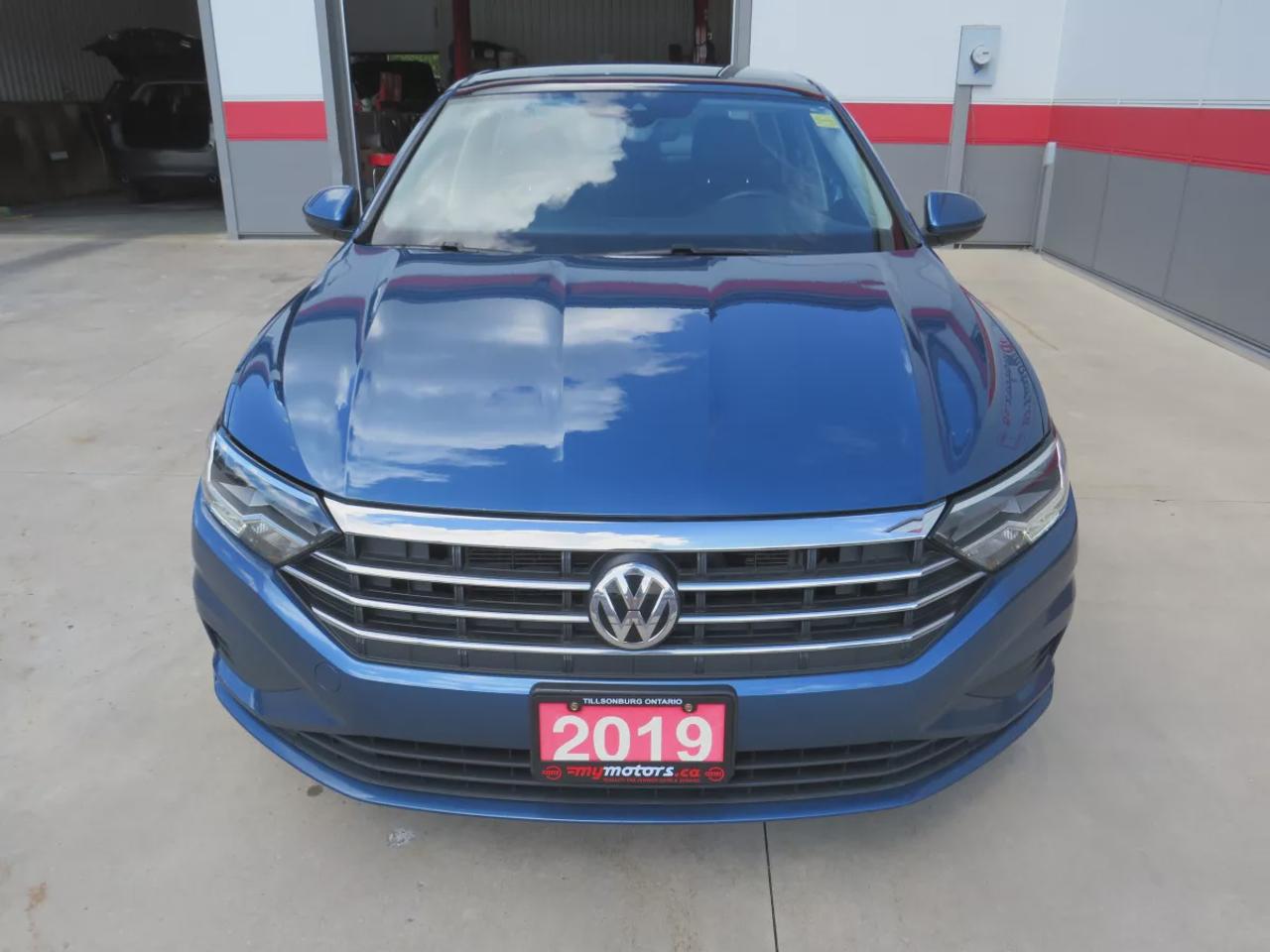 2019 Volkswagen Jetta Highline | FWD | Speed Automatic | Low Kms | Alloy Wheels | Power Sunroof | Leatherette Seats | Heated Front Seats | Dual-Zone Climate Control | Touchscreen Display | Apple CarPlay & Android Auto | Bluetooth | Back-Up Camera | Blind Spot Detection | Rear  Photo1