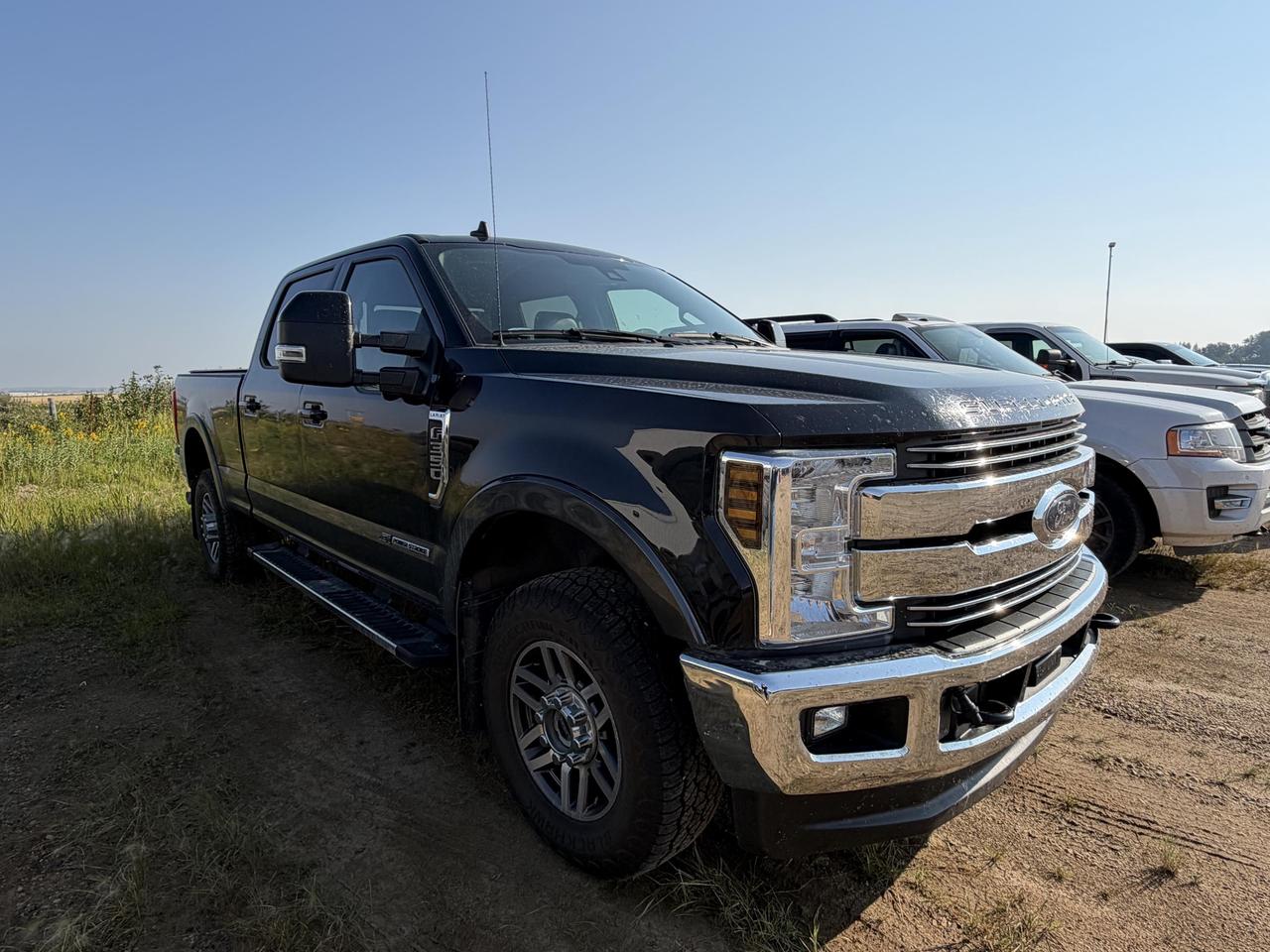 This 2019 Ford Super Duty F-350 LARIAT in Agate Black Metallic is built for those who demand serious capability without sacrificing comfort. Equipped with the LARIAT Ultimate Package, Twin Panel Moonroof, FX4 Off-Road Package, and 5th Wheel/Gooseneck Hitch Prep, this truck is ready to handle heavy hauling and challenging terrain while keeping you and your crew comfortable on and off the job site.

- LARIAT Ultimate Package  top-tier luxury appointments for a heavy-duty work truck
- Twin Panel Moonroof  rare and premium feature on a Super Duty
- FX4 Off-Road Package  purpose-built for demanding terrain with 4WD capability
- 5th Wheel/Gooseneck Hitch Prep Package  ready for serious towing right out of the box
- Remote Start System  warm up or cool down the cab before you even climb in
- 6.7L Power Stroke Diesel V8  proven performance for heavy loads and long hauls
- Crew Cab with 5-passenger seating  room for the whole crew on any job
- Order Code 618A configuration  a purposefully specd build for maximum versatility

Merit Ford Sales is ready to help you put this F-350 to work. Stop by for a test drive, reserve it online, or contact us directly with any questions  our team is here to make the process straightforward and efficient.