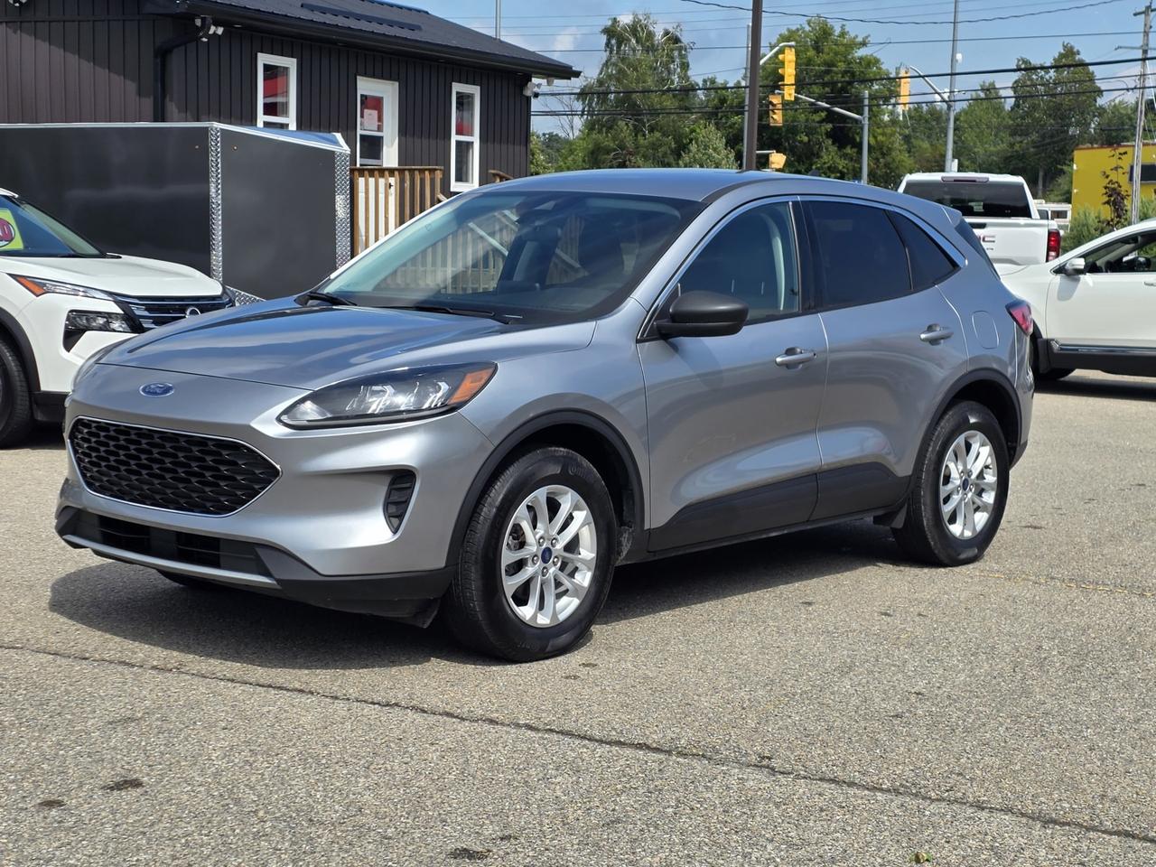 <p><strong>2022 Ford Escape SE AWD Efficient, Comfortable & Packed with Technology!</strong></p><p>Take a look at this <strong>2022 Ford Escape SE AWD</strong>, a versatile and fuel-efficient SUV thats ready for everyday driving and weekend adventures. Powered by a <strong>1.5L EcoBoost 3-cylinder engine</strong> and equipped with <strong>All-Wheel Drive</strong>, this Escape delivers a great combination of responsive performance, efficiency, and year-round confidence.</p><p>Inside, youll enjoy plenty of comfort and convenience with <strong>heated front seats, a power driver seat, dual-zone A/C, power liftgate, and steering wheel controls</strong>. Stay connected on the road with <strong>Navigation, Android Auto, Apple CarPlay, Bluetooth, Smart Device Integration, and a Wi-Fi Hotspot</strong>.</p><p>This Escape is also loaded with advanced safety and driver-assistance technology, including a <strong>Back-Up Camera, Blind Spot Monitor, Cross-Traffic Alert, Front Collision Warning, Lane Departure Warning, Lane Keeping Assist, and Rear Collision Mitigation</strong>. LED headlights provide excellent visibility, while cruise control makes longer drives more relaxing.</p><p>Additional features include <strong>power locks, power mirrors, and power windows</strong>, making this Escape a practical and well-equipped choice for your next SUV.</p><p><strong>Call us today to schedule a test drive!</strong></p><p><strong>Easton Auto Sales</strong><br><strong>613-561-5172</strong></p><p>We are <strong>OMVIC certified and a UCDA member</strong>, conveniently located just minutes from <strong>Kingston and Brockville</strong>. We <strong>pay top dollar for trades</strong>, so bring yours along!</p><p> <strong>Check out our 5-star Google rating and see why customers choose Easton Auto Sales!</strong></p>
