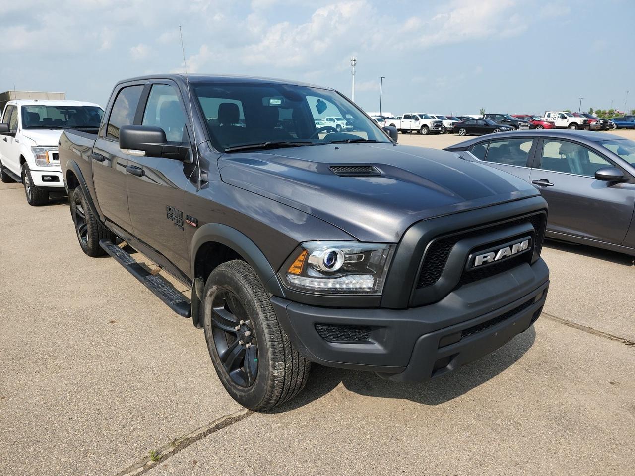 * INCOMING *  * HEATED STEERING WHEEL * REMOTE START * Backup Camera, Heated Steering Wheel, Backup Camera, Bluetooth, XM Satellite Radio Ready, Apple CarPlay, Android Auto, Power Seat, Dual Exhaust, 20 Aluminum Wheels, Dual-Zone Automatic Climate Control, Colour Touchscreen, Heated Seats, Sport Hood and the 5.7L HEMI V8 Engine feature this 2024 Ram 1500 Classic Warlock Crew Cab 4x4.  Text us at 204-400-3001 for more info!  Price does not include GST or PST.  We offer the most competitive finance rates through 13 banks and credit unions  This vehicle is also a Certified Pre-Owned Vehicle which includes: 150+ Point Inspection performed by a GM trained technician Minimum 3 month / 5,000 kms Used Vehicle Limited Warranty 24-hour Roadside Assistance 30 day / 2,500 km Exchange Privilege  Please read all ads carefully.