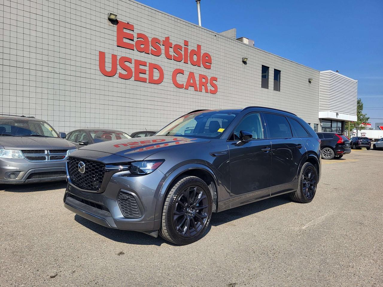 This <i>previously enjoyed</i> <b>2025 Mazda CX-70 MHEV</b> is part of Mazdas 4WD Sport Utility Vehicles segment and a very nice ride! It has a 6 cylinder engine and&nbspAutomatic transmission. This&nbspCX-70 MHEV came into our Pre-Owned inventory with <b> 32593</b> kilometers and in good condition. The color is a nice <b></b> and aside from the wear and tear of a previously enjoyed vehicle, it is a very nice <b>CX-70 MHEV</b>!!

 Dont forget to explore the options tab for more details. If youre satisfied with what youve learned thus far, kindly fill out one of the forms on this page. One of our proficient and extensively trained sales representatives will provide you with a product demonstration, a personalized video walk-through, and of course, details on pricing and financing options.  

  We know we are not the only Pre-Owned dealer in Calgary, but we pride ourselves on being one of the busiest in town. With over <u><b>150 units in our Pre-Owned inventory</u></b> and being one of Canadas <b>TOP 5</b> Dodge Chrysler Jeep Ram dealers, we are confident that we have exactly what you are looking for! 

   Thank you for considering purchasing this <b> 2025 Mazda CX-70 MHEVAt Eastside Dodge, we are thrilled to offer you an exceptional experience. We pledge to ensure that it surpasses all your expectations and becomes one of your finest experiences. 




</b>