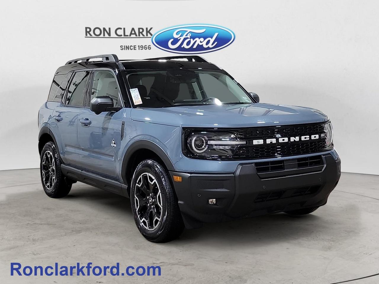 Experience refined adventure in this 2025 Ford Bronco Sport Outer Banks, finished in a striking Azure Gray Metallic Tri-Coat exterior with a sophisticated Ebony interior. Designed for those who crave both comfort and capability, this premium trim blends upscale styling with rugged performance.Under the hood, the 1.5L EcoBoost® engine paired with an 8-speed automatic transmission delivers confident power and smooth efficiency—perfect for city streets or off-road escapes. Enjoy open-air freedom with the power moonroof, and stay connected and in control with the Outer Banks Tech Package, featuring advanced driver-assist technologies, premium audio, and intuitive connectivity options.The Bronco Sport Outer Banks stands out with signature badging, sleek 18-inch machined-face wheels, and a refined interior that includes heated leather-trimmed seats, ambient lighting, and modern convenience throughout.Come to the dealer you can trust. 58 years and counting Ron Clark Ford & Jayco RV is known for great value and being best in customer service! We serve and deliver all over Ontario including destinations such as Wyoming, Petrolia, Sarnia, London, Guelph, Kitchener-Waterloo, Hamilton, GTA, Ottawa & Chatham-Kent. Call or visit us at RON CLARK FORD & JAYCO RV to view and test drive today! RON CLARK FORD where else!!