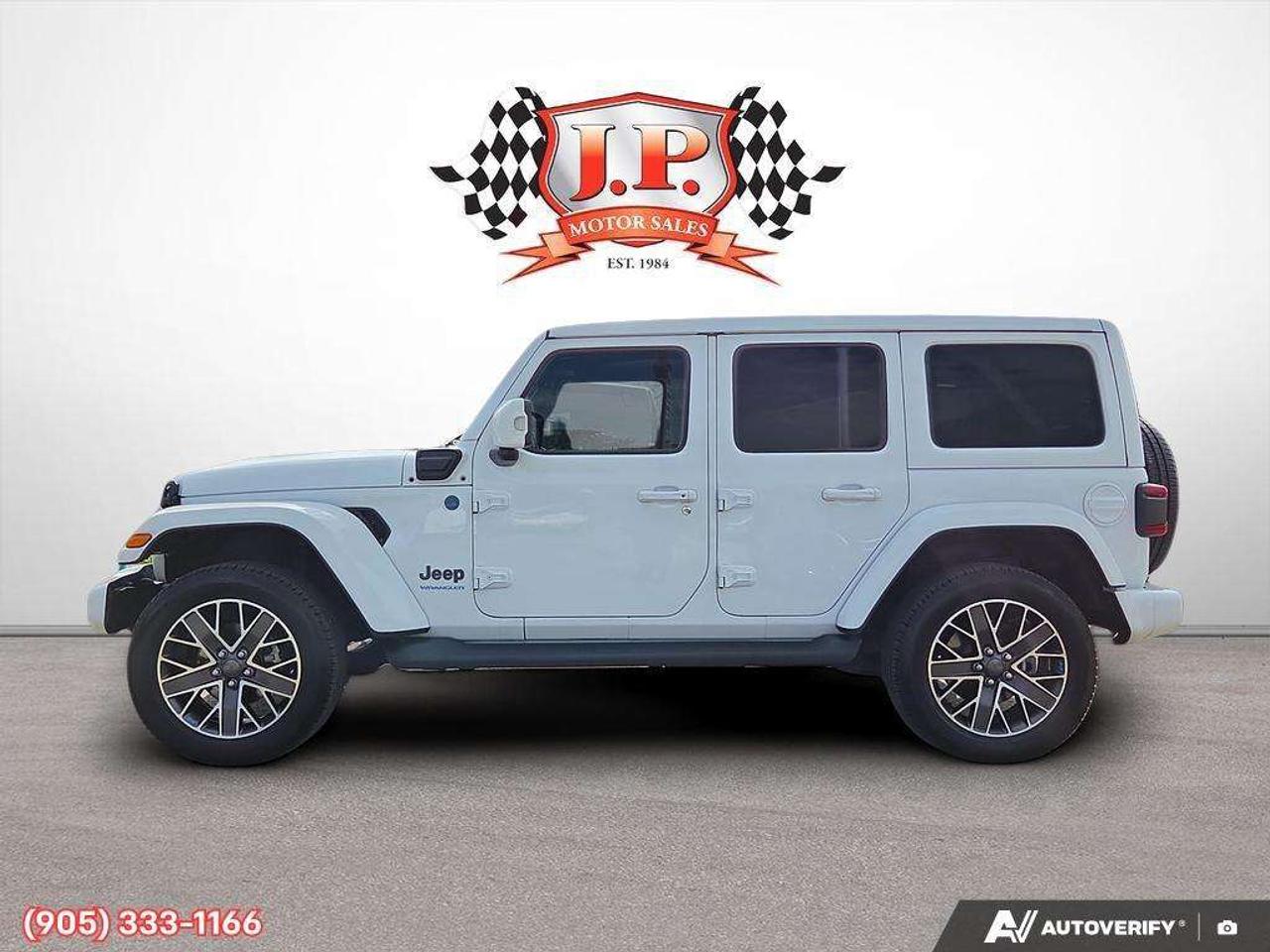 2023 Jeep Wrangler Sahara Apple CarPlay & Android Auto • Built-In Navigation System • Remote Start System • Heated Front Seats • Running Boa Photo