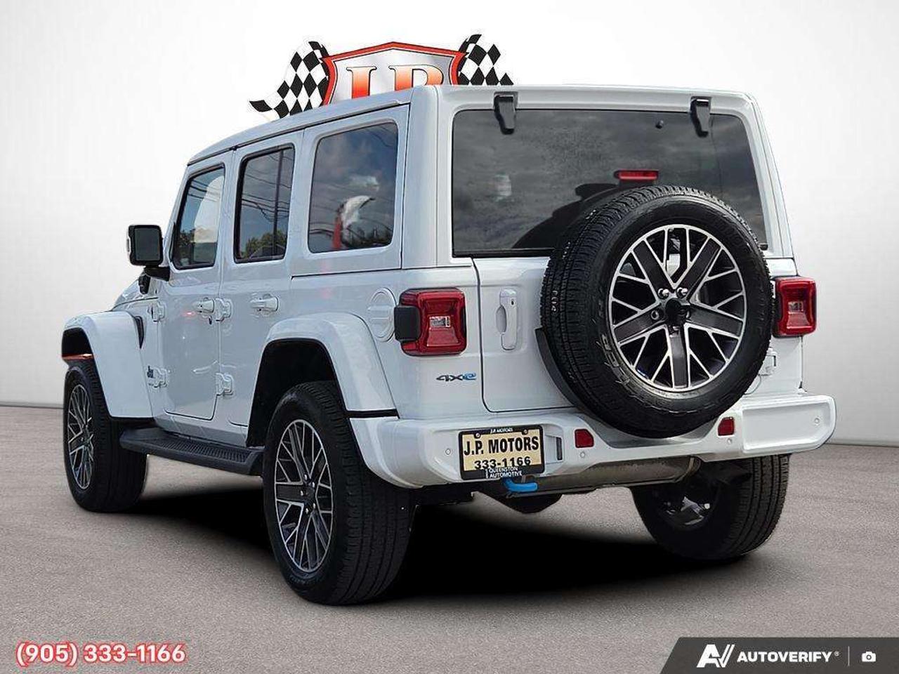 2023 Jeep Wrangler Sahara Apple CarPlay & Android Auto • Built-In Navigation System • Remote Start System • Heated Front Seats • Running Boa Photo