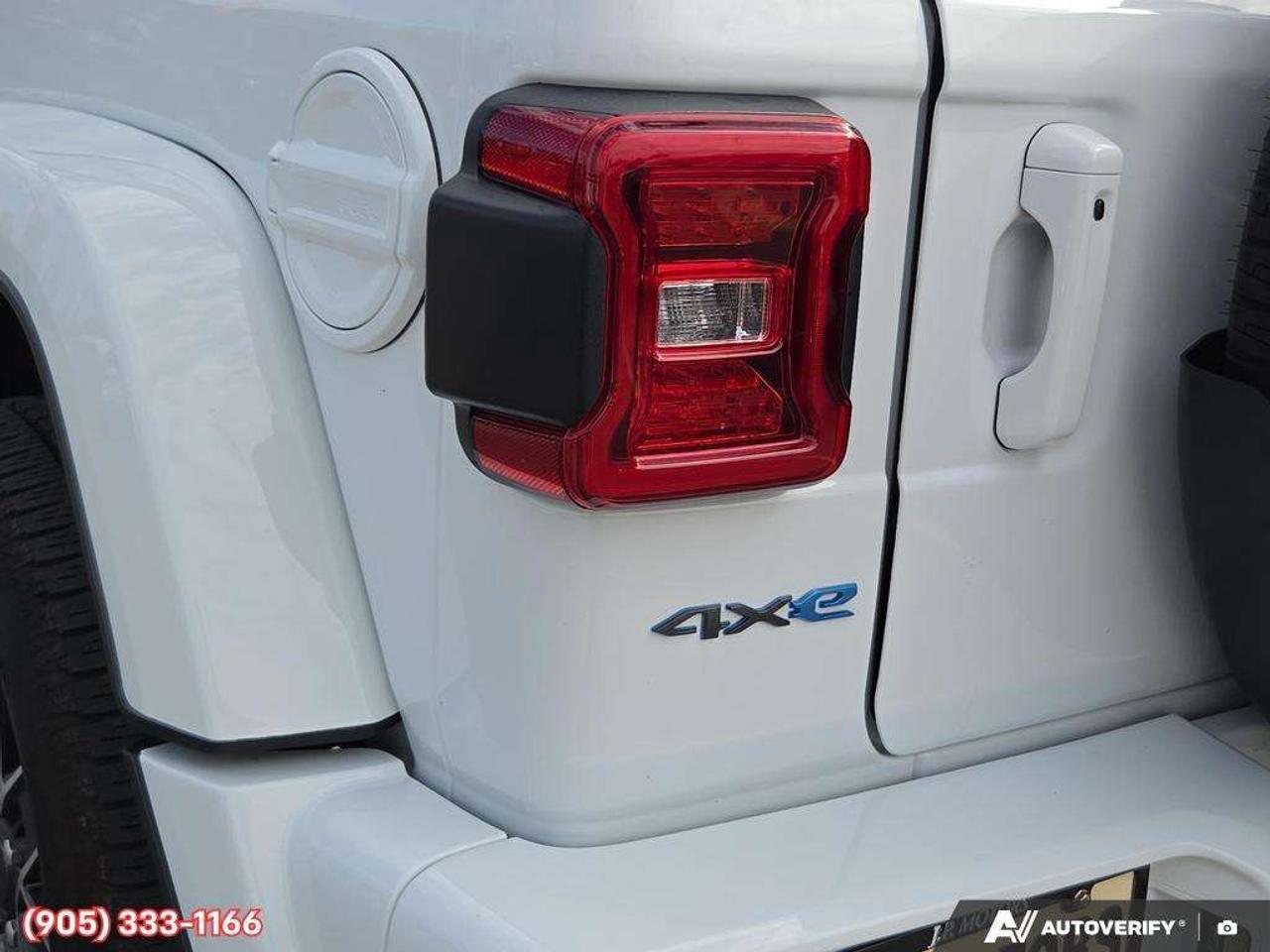 2023 Jeep Wrangler Sahara Apple CarPlay & Android Auto • Built-In Navigation System • Remote Start System • Heated Front Seats • Running Boa Photo