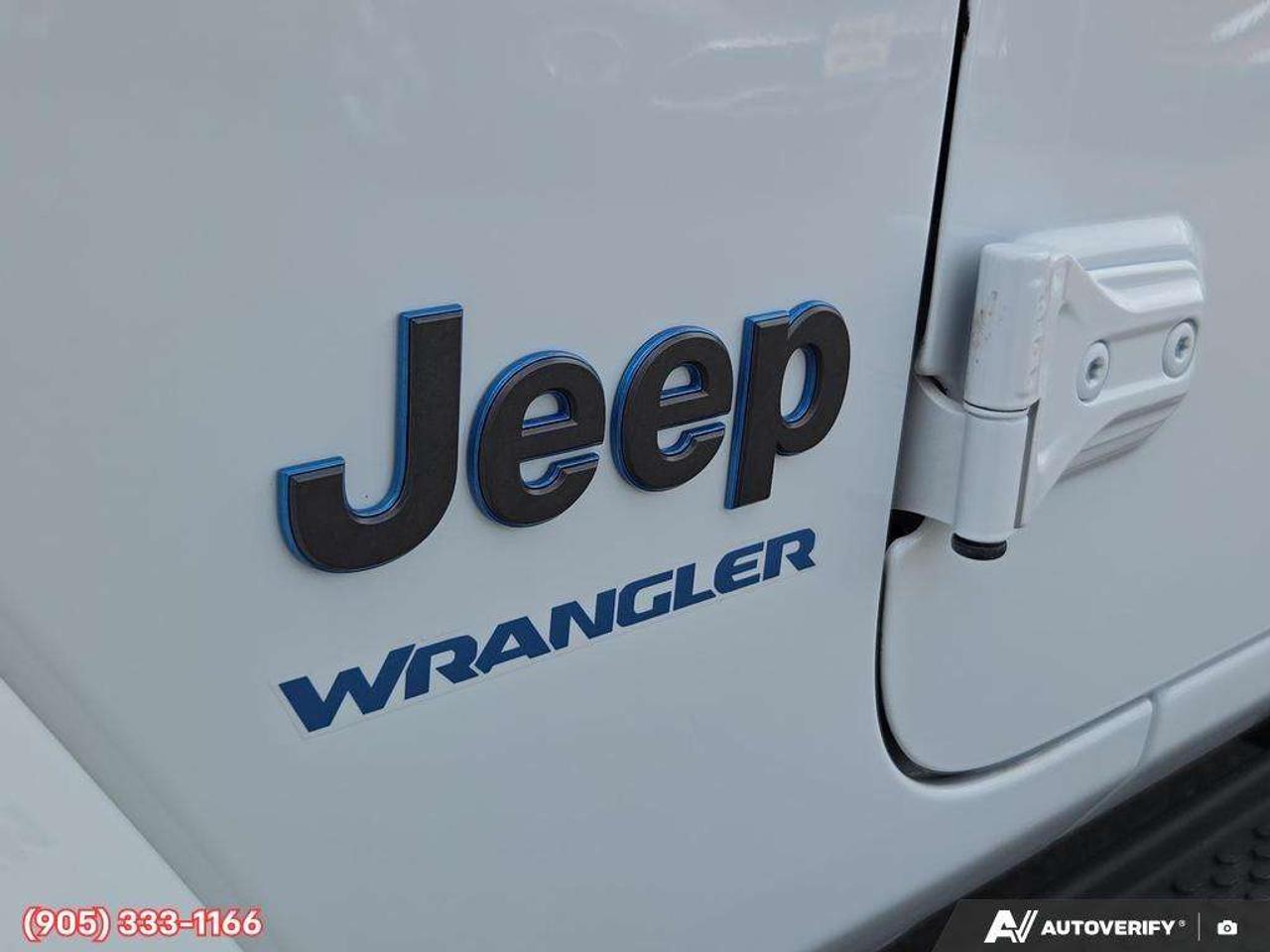 2023 Jeep Wrangler Sahara Apple CarPlay & Android Auto • Built-In Navigation System • Remote Start System • Heated Front Seats • Running Boa Photo