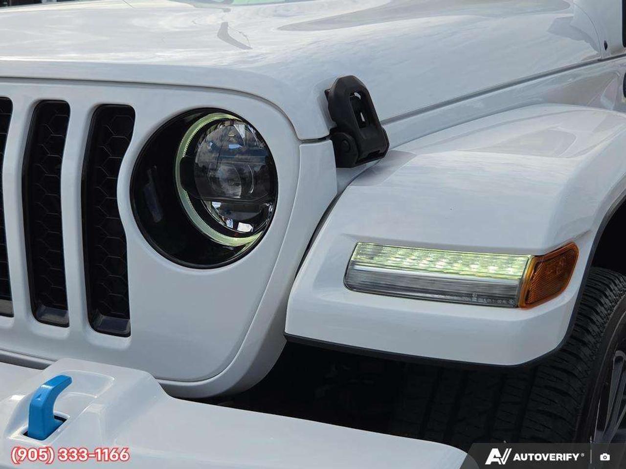 2023 Jeep Wrangler Sahara Apple CarPlay & Android Auto • Built-In Navigation System • Remote Start System • Heated Front Seats • Running Boa Photo