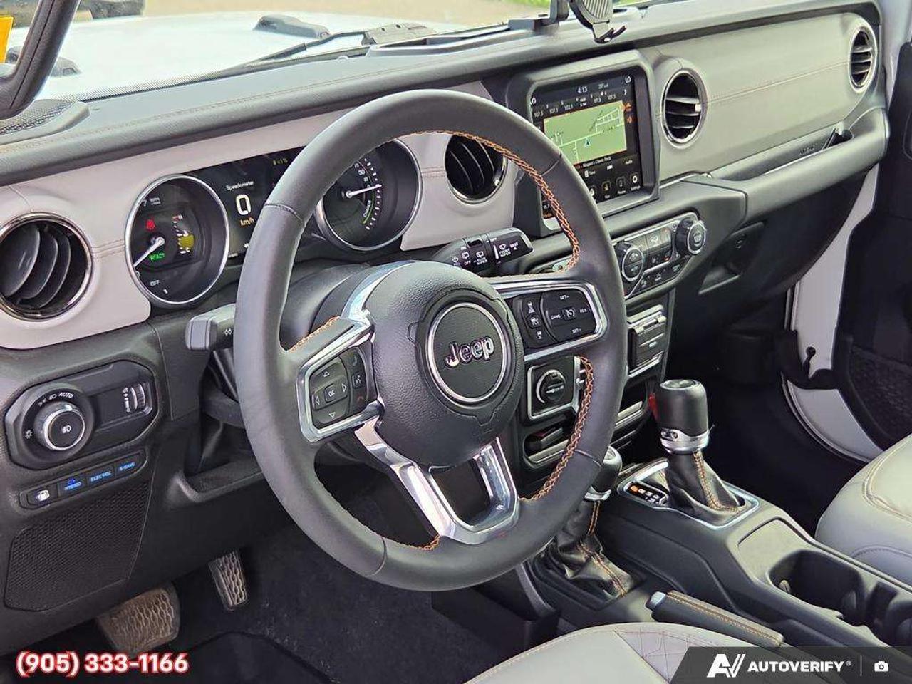 2023 Jeep Wrangler Sahara Apple CarPlay & Android Auto • Built-In Navigation System • Remote Start System • Heated Front Seats • Running Boa Photo