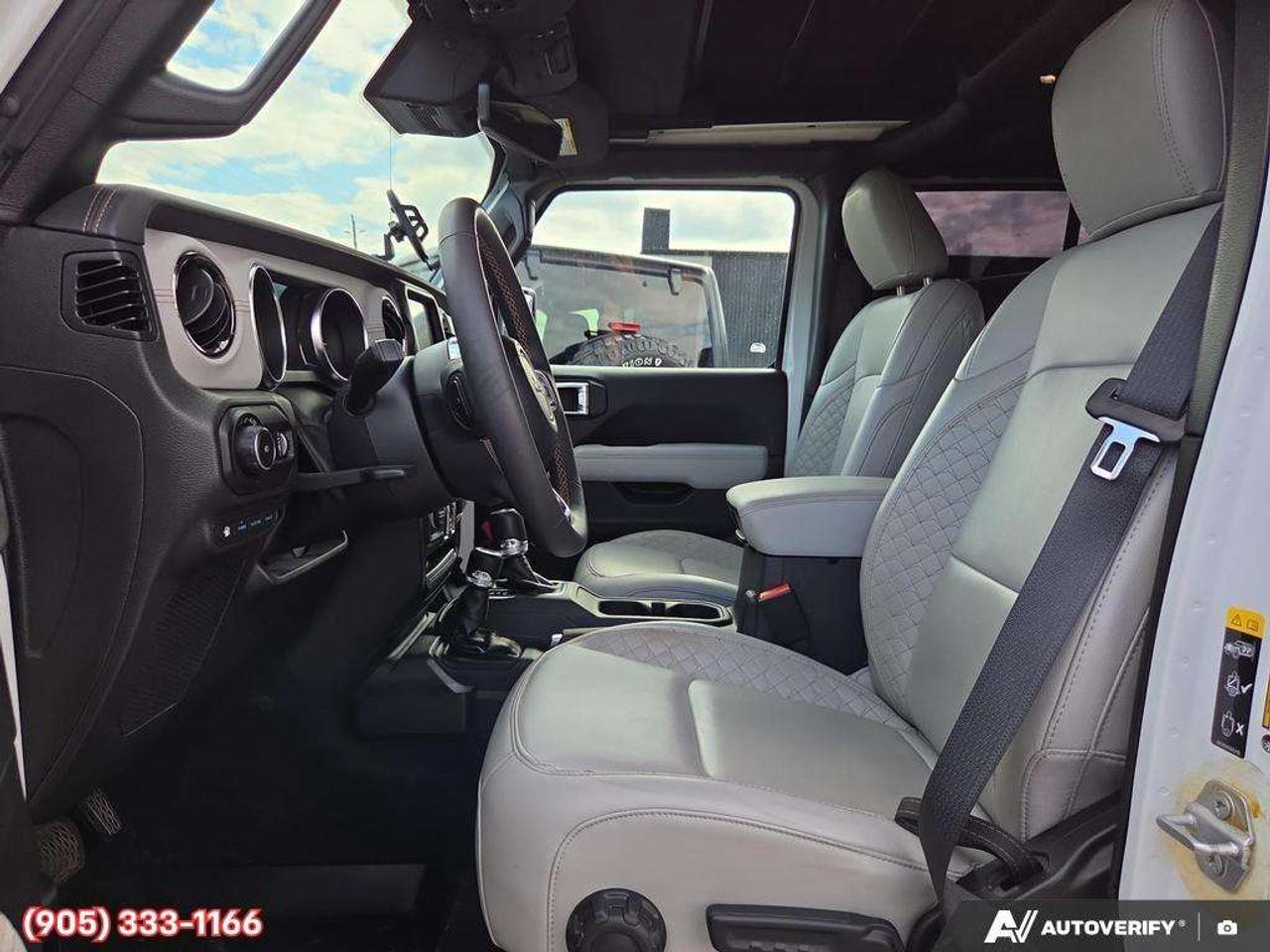 2023 Jeep Wrangler Sahara Apple CarPlay & Android Auto • Built-In Navigation System • Remote Start System • Heated Front Seats • Running Boa Photo