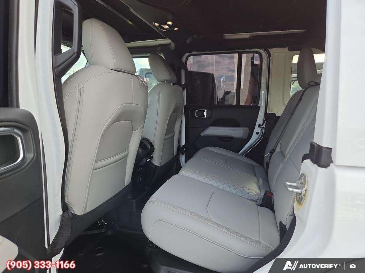 2023 Jeep Wrangler Sahara Apple CarPlay & Android Auto • Built-In Navigation System • Remote Start System • Heated Front Seats • Running Boa Photo