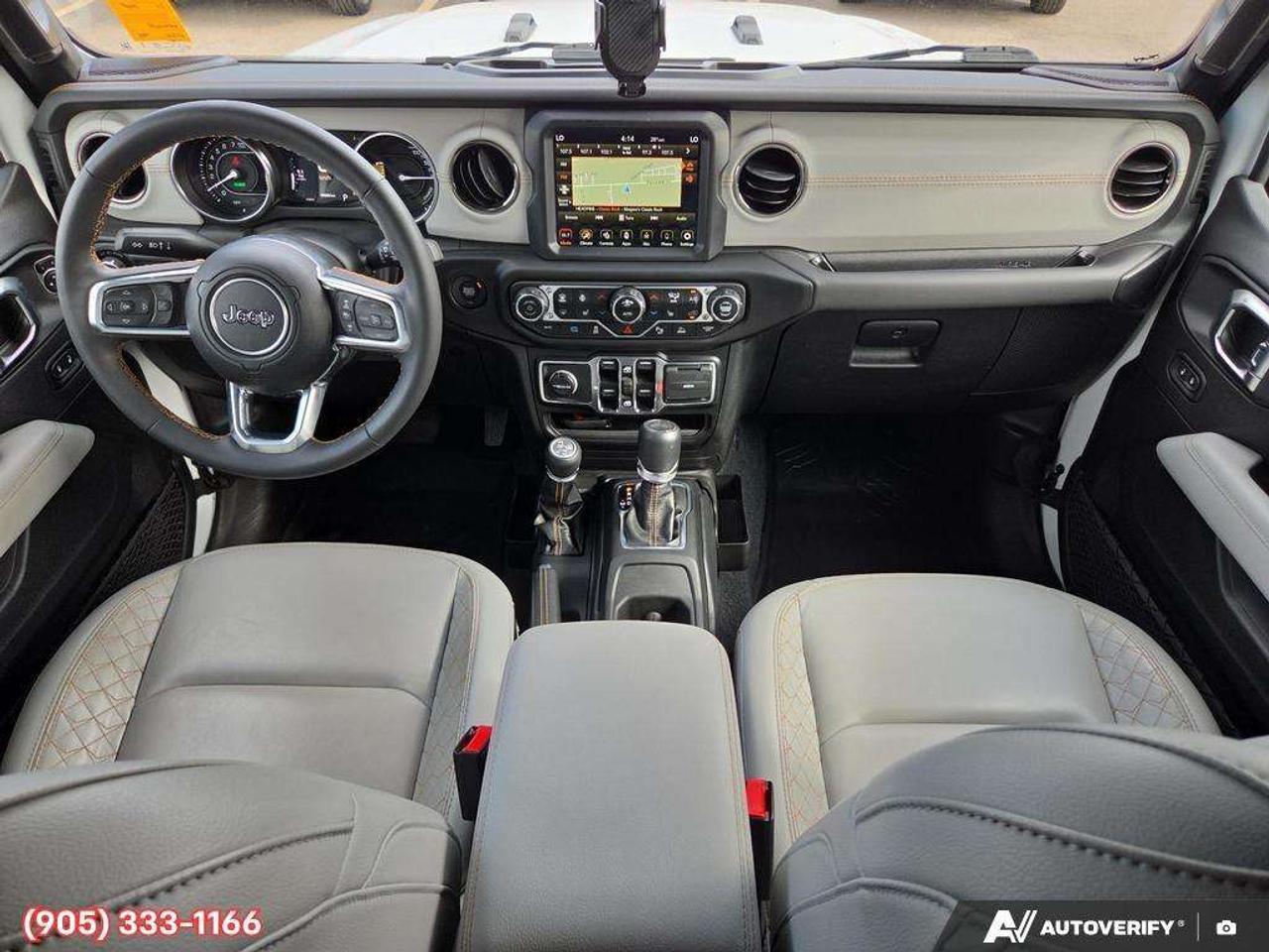 2023 Jeep Wrangler Sahara Apple CarPlay & Android Auto • Built-In Navigation System • Remote Start System • Heated Front Seats • Running Boa Photo
