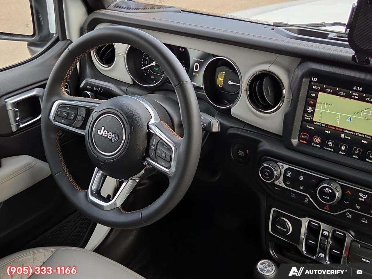 2023 Jeep Wrangler Sahara Apple CarPlay & Android Auto • Built-In Navigation System • Remote Start System • Heated Front Seats • Running Boa Photo