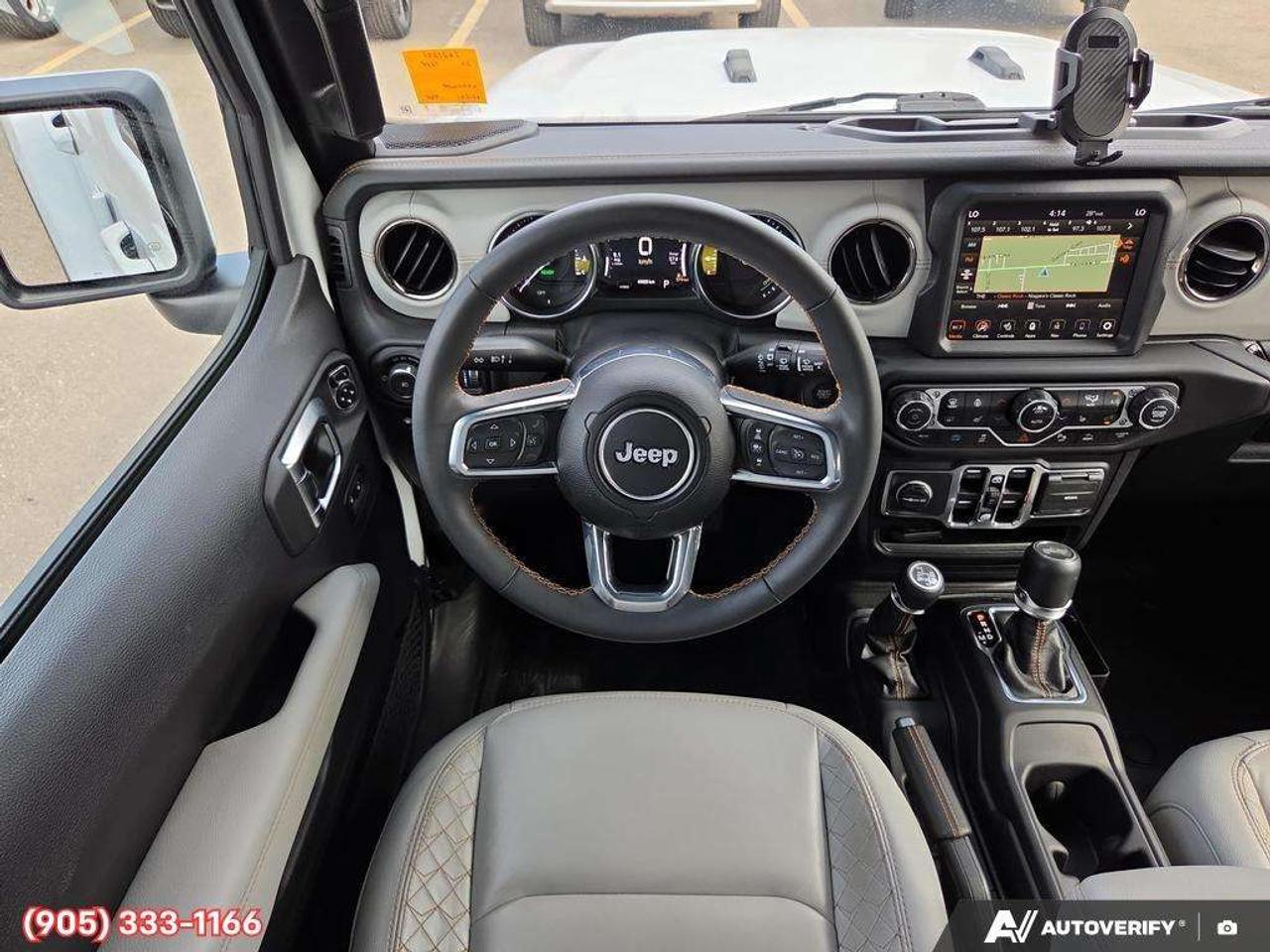 2023 Jeep Wrangler Sahara Apple CarPlay & Android Auto • Built-In Navigation System • Remote Start System • Heated Front Seats • Running Boa Photo
