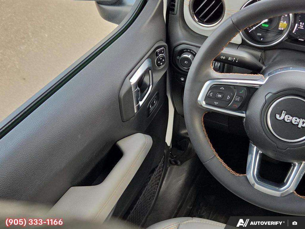 2023 Jeep Wrangler Sahara Apple CarPlay & Android Auto • Built-In Navigation System • Remote Start System • Heated Front Seats • Running Boa Photo