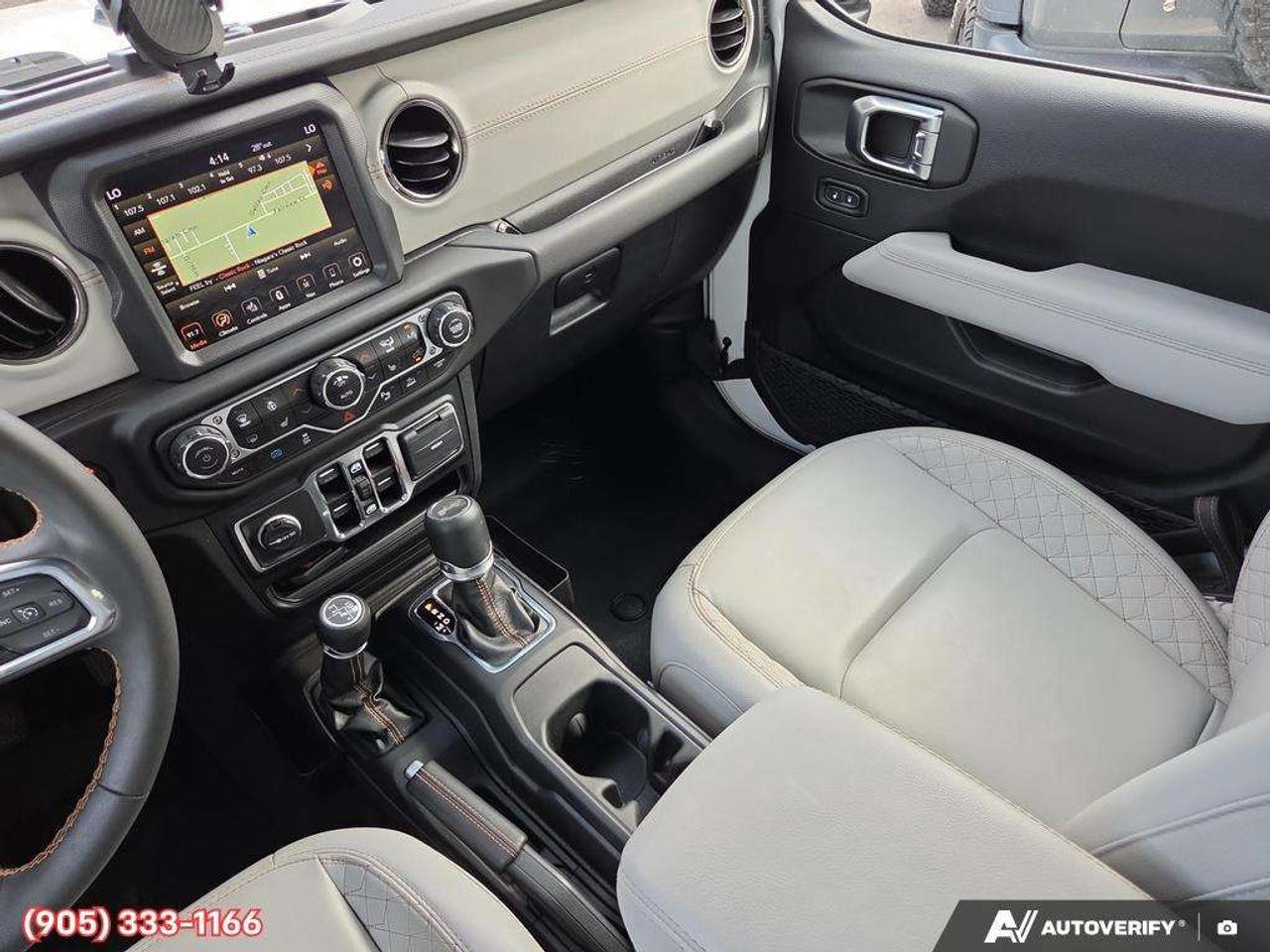 2023 Jeep Wrangler Sahara Apple CarPlay & Android Auto • Built-In Navigation System • Remote Start System • Heated Front Seats • Running Boa Photo