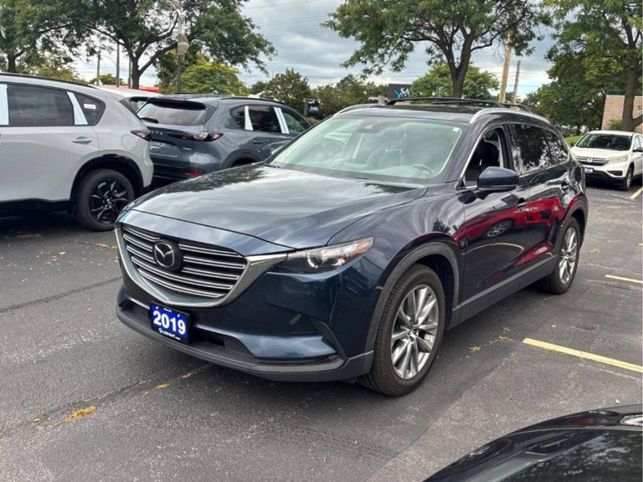 2019 MAZDA CX-9 GS-L SKYACTIV<br>FULLY CERTIFIED WITH WARRANTY<br><br>WAS $18990 | NOW $16990<br>163,000 KM | STK#10321<br><br>ABOUT THIS VEHICLE<br><br>This 2019 MAZDA CX-9 GS-L SKYACTIV is equipped with:<br><br>* Automatic Transmission<br>* Leather Seats<br>* Sunroof<br>* Heated Seats<br>* Navigation<br>* All Wheel Drive<br>* Bluetooth<br>* Reverse Camera<br>* Alloy Wheels<br>* 7 Passenger<br>* Power Windows<br>* Power Locks<br>* Power Mirrors<br>* Air Conditioning<br><br>WHATS INCLUDED?<br><br>FULL SAFETY CERTIFICATION<br>Every vehicle at First Choice Motors is sold fully certified at no extra charge.<br><br>BRAND NEW BRAKES<br>Brand new brake rotors and pads are included with every vehicle purchase.<br><br>36-DAY WARRANTY<br>Every vehicle includes a 36-day warranty on all safety-related items.<br><br>EXTENDED WARRANTY AVAILABLE<br>Additional protection plans are available for up to 5 years.<br><br>FINANCING AVAILABLE<br><br>We work with a wide range of credit situations, including:<br><br>* Good Credit<br>* Bad Credit<br>* No Credit<br>* Students<br>* Newcomers to Canada<br><br>Financing available O.A.C.<br><br>SHOP YOUR WAY<br><br>* Shop In Person<br>* 100% Online Purchase Available<br>* FREE Delivery Across Ontario<br><br>WHY FIRST CHOICE MOTORS?<br><br>First Choice Motors specializes in affordable cars, SUVs and vans, with 300  vehicles in stock and a large selection priced between $5,000 and $15,000.<br><br>Our goal is simple: affordable vehicles, transparent pricing and an easy car-buying experience.<br><br>PRICE & FEES<br><br>Advertised price INCLUDES the $22 OMVIC transaction fee.<br><br>Additional Charges:<br><br>* 13% HST<br>* Licence Plates <br>* Ownership Registration<br><br>NO ADDITIONAL CERTIFICATION FEE.<br><br>No credit card payments can be accepted for vehicle purchases.<br>