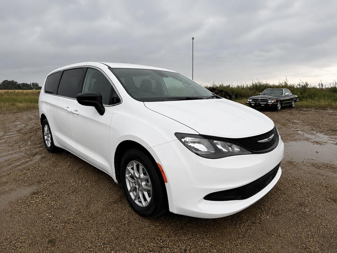 The 2024 Chrysler Grand Caravan SXT is built for families who need space, comfort, and smart technology without compromise. With a punchy 3.6L Pentastar V6 paired to a smooth 9-speed automatic, heated front seats, dual power sliding doors, and a power liftgate, this minivan delivers the everyday conveniences that make a real difference when youre hauling kids, gear, and everything in between.

- 3.6L Pentastar VVT V6 with 9-Speed Automatic Transmission for confident, efficient driving
- Dual Power Sliding Rear Doors and Power Liftgate for hands-free, easy loading
- Apple CarPlay & Android Auto for seamless smartphone connectivity on every trip
- Driver & Passenger Heated Front Seats and Heated Steering Wheel for year-round comfort
- Proximity Key with Push Button Start and Remote Start via keyfob for added convenience
- Stow-and-Go style fold-into-floor 2nd and 3rd row seating for flexible cargo space
- ParkView Backup Camera, Forward Collision Warning with Active Braking, and Electronic Stability Control for peace of mind
- Dual Zone Front Air Conditioning plus Rear HVAC with Separate Controls to keep everyone comfortable

Ready to see it in person? Visit Merit Ford Sales to book a test drive, ask our team any questions, or get started on your purchase today. Were here to make the process straightforward and stress-free.