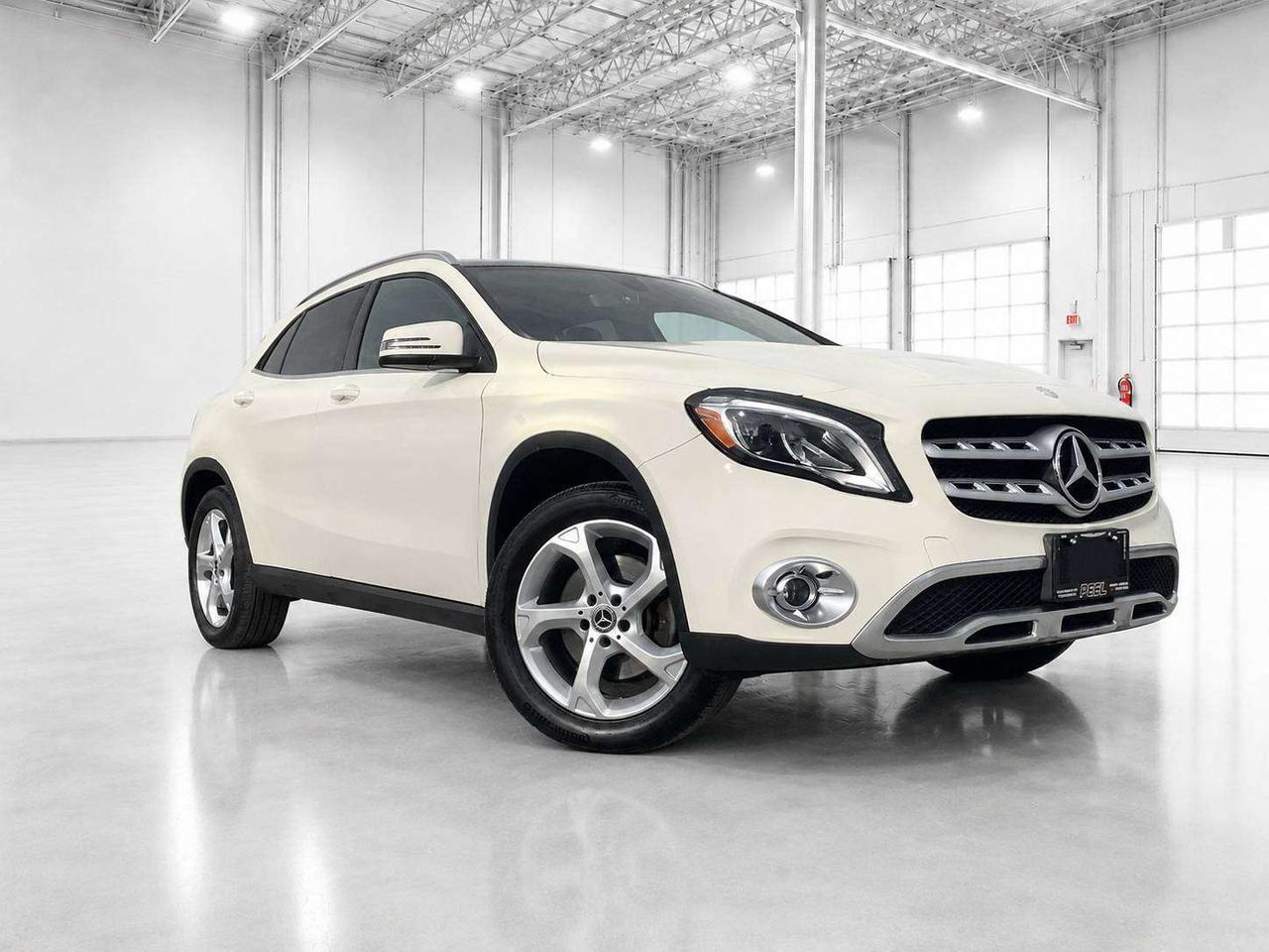 COME SEE WHY NOBODY BEATS A DEAL FROM PEEL! Your Source for ALL make and models used cars and trucks. 2018 Mercedes-Benz GLA 250 4MATIC | 2.0L Turbocharged 4-Cylinder Engine | 208 HP | White | Black Premium Interior | Panoramic Sunroof | COMAND Navigation System | Rear Back-Up Camera | Power Driver Seat with Memory | Dual-Zone Automatic Climate Control | Bluetooth Hands-Free Calling & Audio Streaming | USB Connectivity | Leather-Wrapped Multifunction Steering Wheel | Paddle Shifters | Cruise Control | Automatic Headlights | LED Daytime Running Lights | Front Fog Lamps | Power Windows & Locks | Split-Folding Rear Seats | 18-Inch Alloy Wheels | 4MATIC All-Wheel Drive This 2018 Mercedes-Benz GLA 250 4MATIC is a sharp, compact luxury SUV that combines turbocharged performance, all-wheel-drive confidence, and the premium features that matter most. Its 2.0L turbocharged engine produces 208 horsepower and is paired with Mercedes-Benz 4MATIC all-wheel drive, giving it responsive everyday power and reassuring traction through Canadian winters. Finished in White over a black premium interior, it is equipped with a panoramic sunroof, factory COMAND navigation, rear back-up camera, driver memory seat, dual-zone automatic climate control, Bluetooth, USB connectivity, paddle shifters, and 18-inch alloy wheels. The versatile rear cargo area and split-folding rear seats make it far more practical than a typical luxury hatchback, while the elevated driving position and compact footprint make it easy to enjoy around town. This is a well-equipped GLA 250 4MATIC with the comfort, style, and all-season usability buyers expect from Mercedes-Benz. ______________________________________________________ Winter Tires on Alloy Wheels (No Extra Charge, may not be road-worthy. As Is) FREE CarFax included! Click the CarFax link in the listing to view the report. Our advertised prices are for consumers/end users only and are not intended for dealer, wholesale, exporter, or broker purchases. ______________________________________________________ Peel Chrysler is based in Port Credit, Mississauga, and proudly serves customers across Ontario and Canada, including Toronto, Oakville, North York, Richmond Hill, Ajax, Hamilton, Niagara Falls, Brampton, Scarborough, Vaughan, London, Windsor, Cambridge, Kitchener, Waterloo, Brantford, Sarnia, Pickering, Huntsville, Milton, Woodbridge, Aurora, Newmarket, Orangeville, Georgetown, Markham, North Bay, Sudbury, Barrie, Oshawa, Kingston, Innisfil, and surrounding areas. Browse our selection of used cars, trucks, SUVs, vans, Ram, Jeep, Dodge, Chrysler, FIAT, and all makes and models at peelchrysler.com. ______________________________________________________ Disclaimer: Prices are for consumer/end-user purchases only. Advertised prices are all-in and include all dealer fees and charges, including the $599 loan processing fee where applicable, except HST, Fuel and Licensing, unless otherwise stated. Payments, rates, and terms are subject to approved credit and may change without notice. If a trade-in has an outstanding loan balance and Peel Chrysler is required to facilitate the lien payout, a $349 lien payout fee applies. Most pre-owned vehicles originally come with two keys; however, all Peel Chrysler pre-owned vehicles come standard with one key unless otherwise stated. Vehicle images may be digitally adjusted or enhanced for presentation purposes and may not always reflect the exact appearance of the vehicle. While we make every effort to ensure accuracy, vehicle details, features, options, materials, history, specifications, pricing, availability, and CarFax information should be verified with Peel Chrysler before purchase.