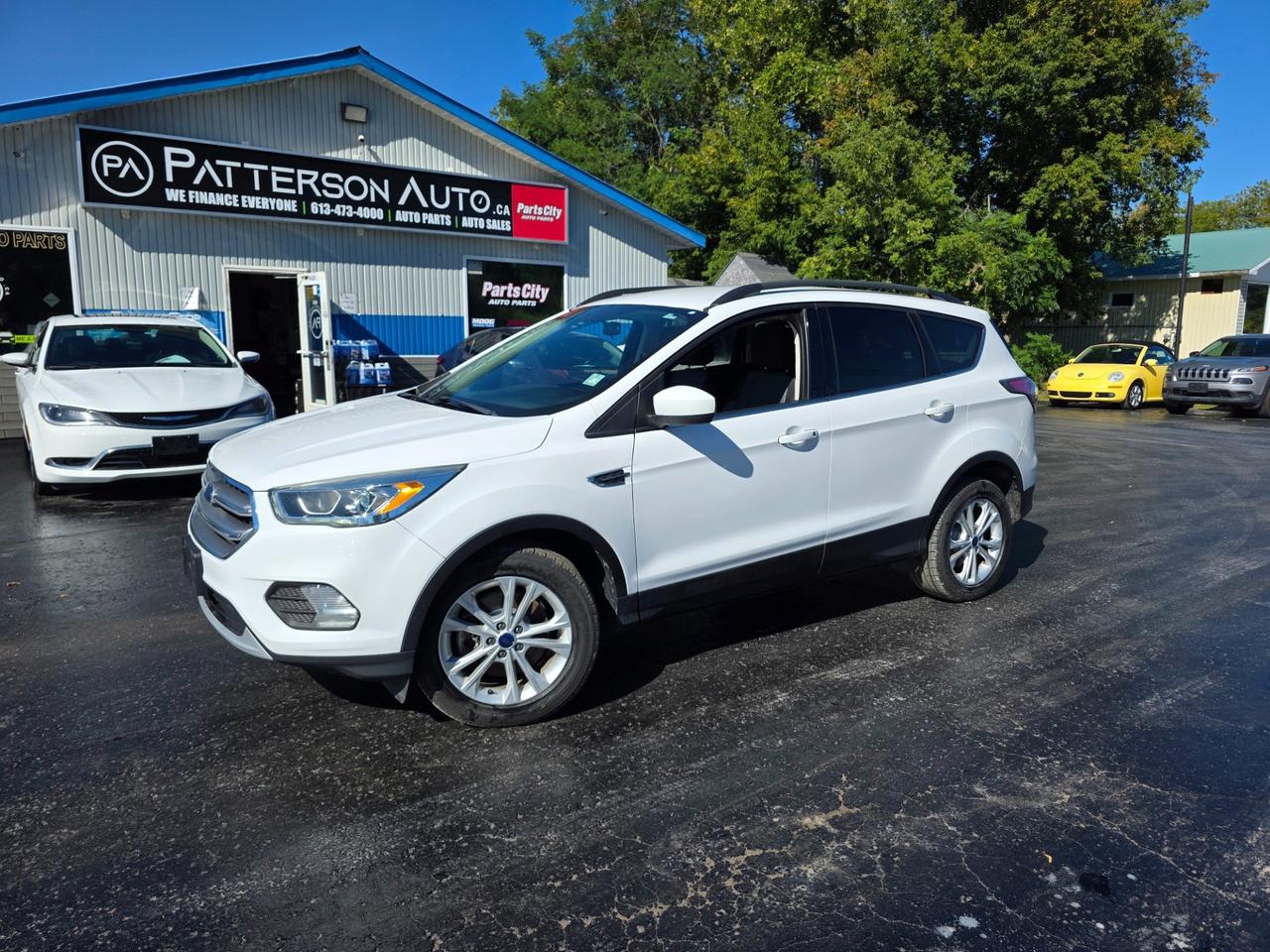2017 Ford Escape SE 4WD. Powered by the 1.5L EcoBoost four-cylinder with automatic transmission and four-wheel drive, finished in Oxford White with charcoal black cloth. Equipped with air conditioning, heated seats, heated mirrors, back-up camera, satellite radio, cruise control and alloy wheels. 100,089 km. Stock B24304. Low interest financing available. Trades welcome. Call Patterson Auto Sales in Madoc to book a test drive.