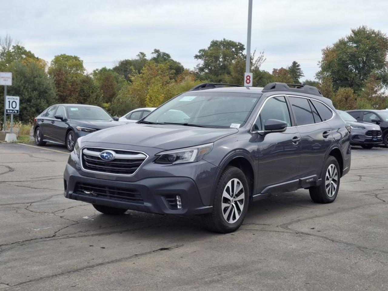 2022 Subaru Outback Touring AWD | Sunroof | Heated Seats + Steering | Power Liftgate | CarPlay + Android | and More ! Photo0