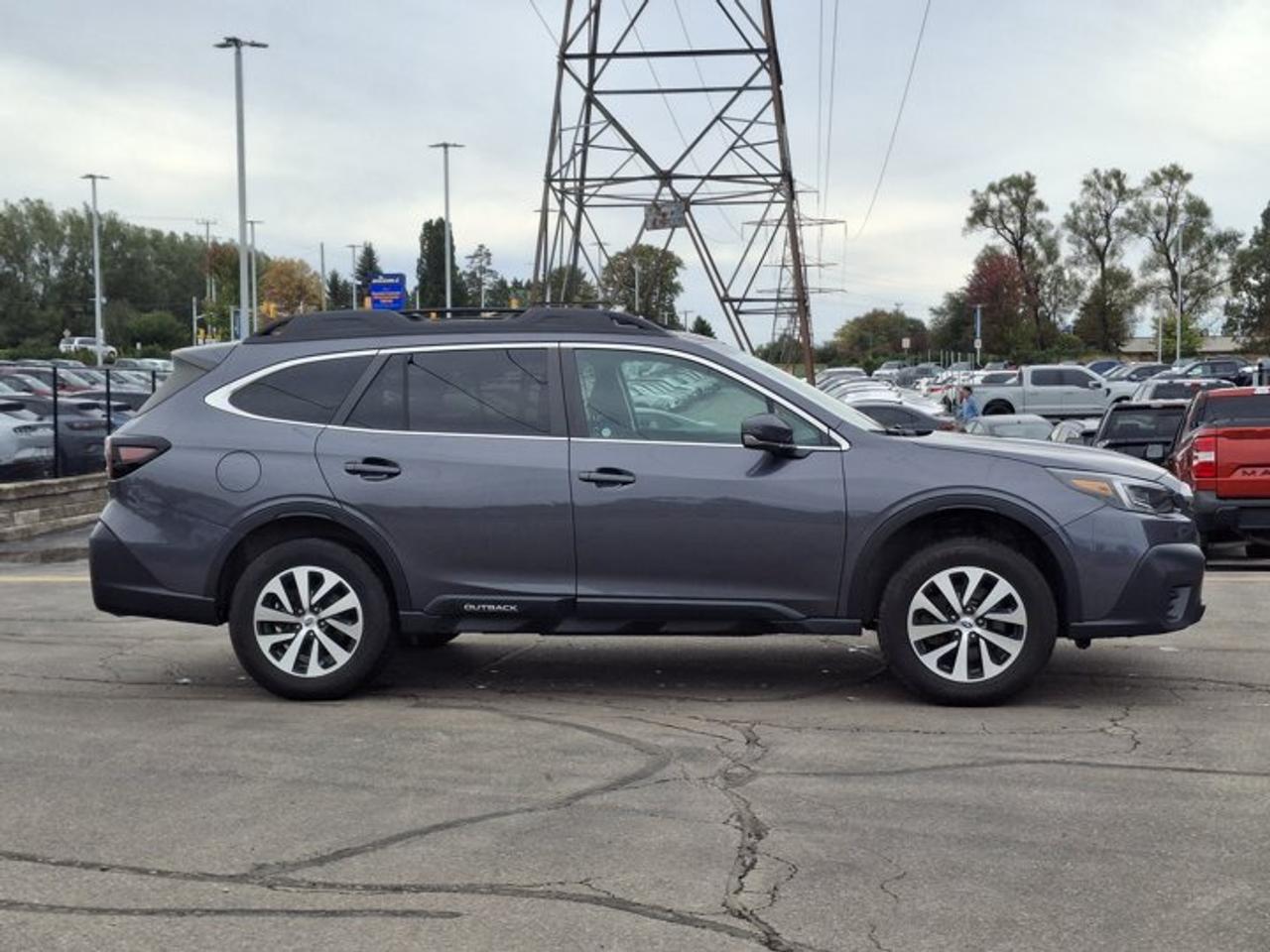 2022 Subaru Outback Touring AWD | Sunroof | Heated Seats + Steering | Power Liftgate | CarPlay + Android | and More ! Photo
