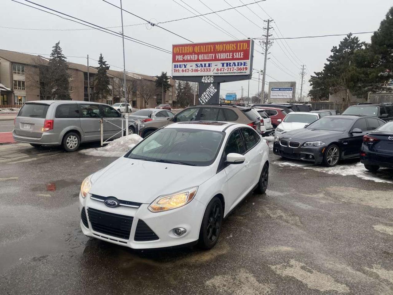 2013 Ford Focus 4dr Sdn Titanium Photo0