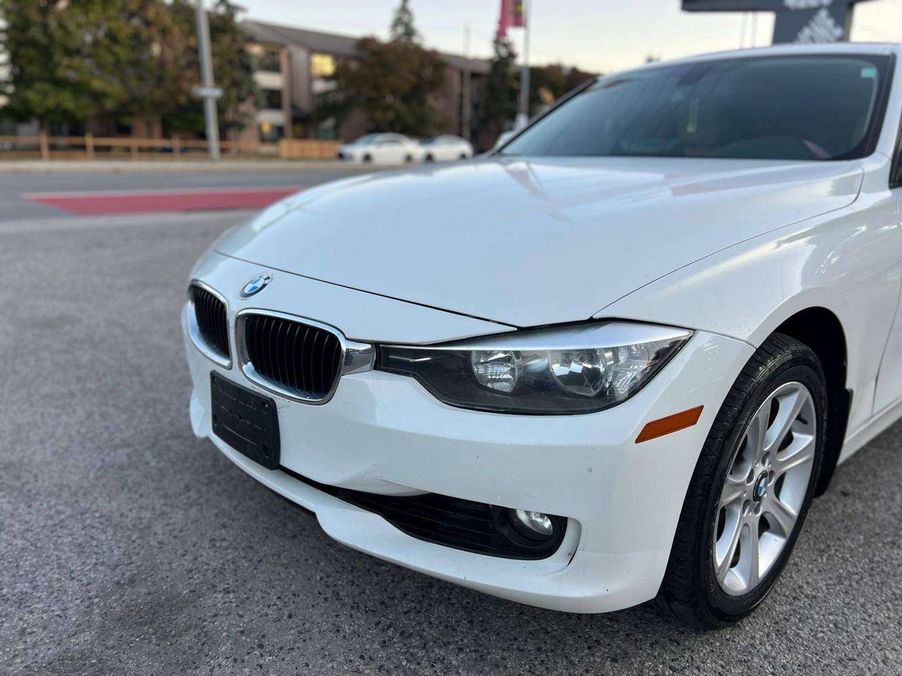 2013 BMW 3 Series 4dr Sdn 328i xDrive AWD Photo