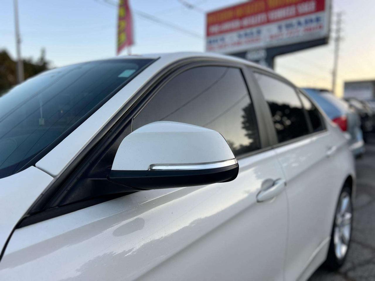2013 BMW 3 Series 4dr Sdn 328i xDrive AWD Photo