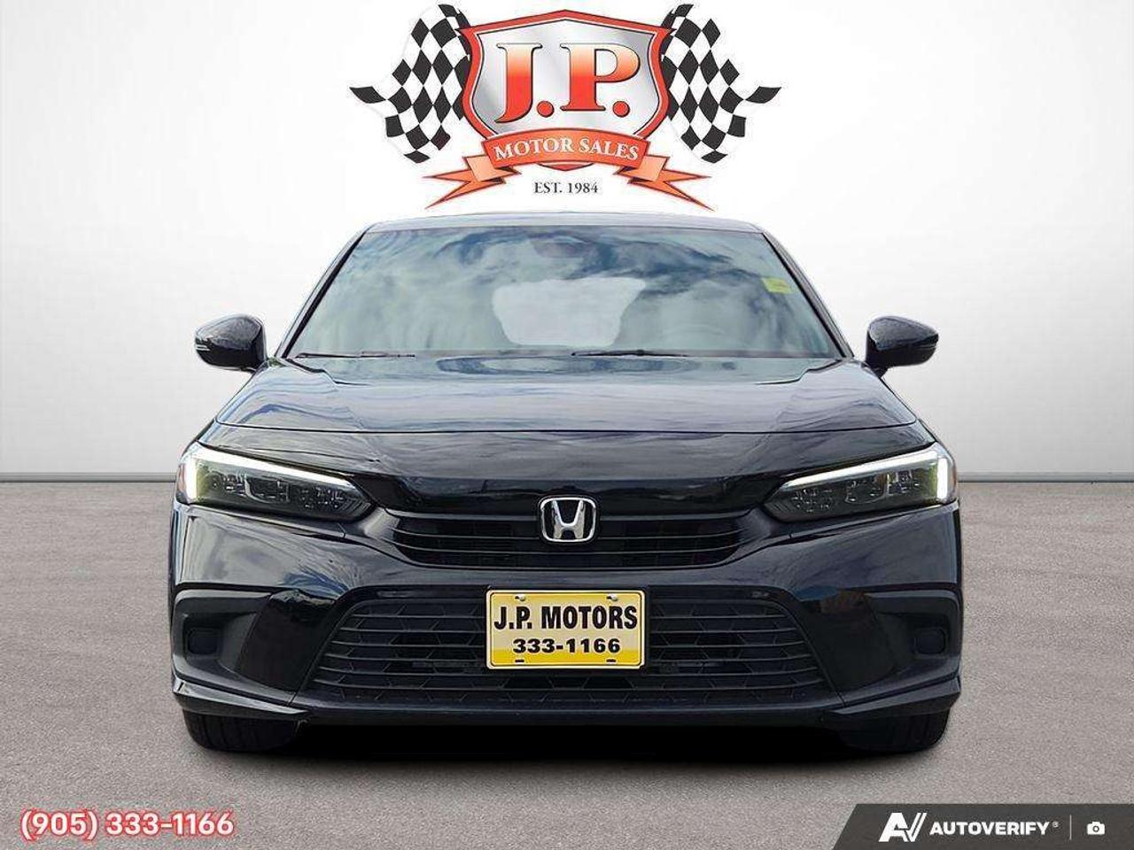 2023 Honda Civic Sport Apple CarPlay & Android Auto • Power Sunroof • Remote Start System • Heated Front Seats • Lane Assist • Backup Came Photo