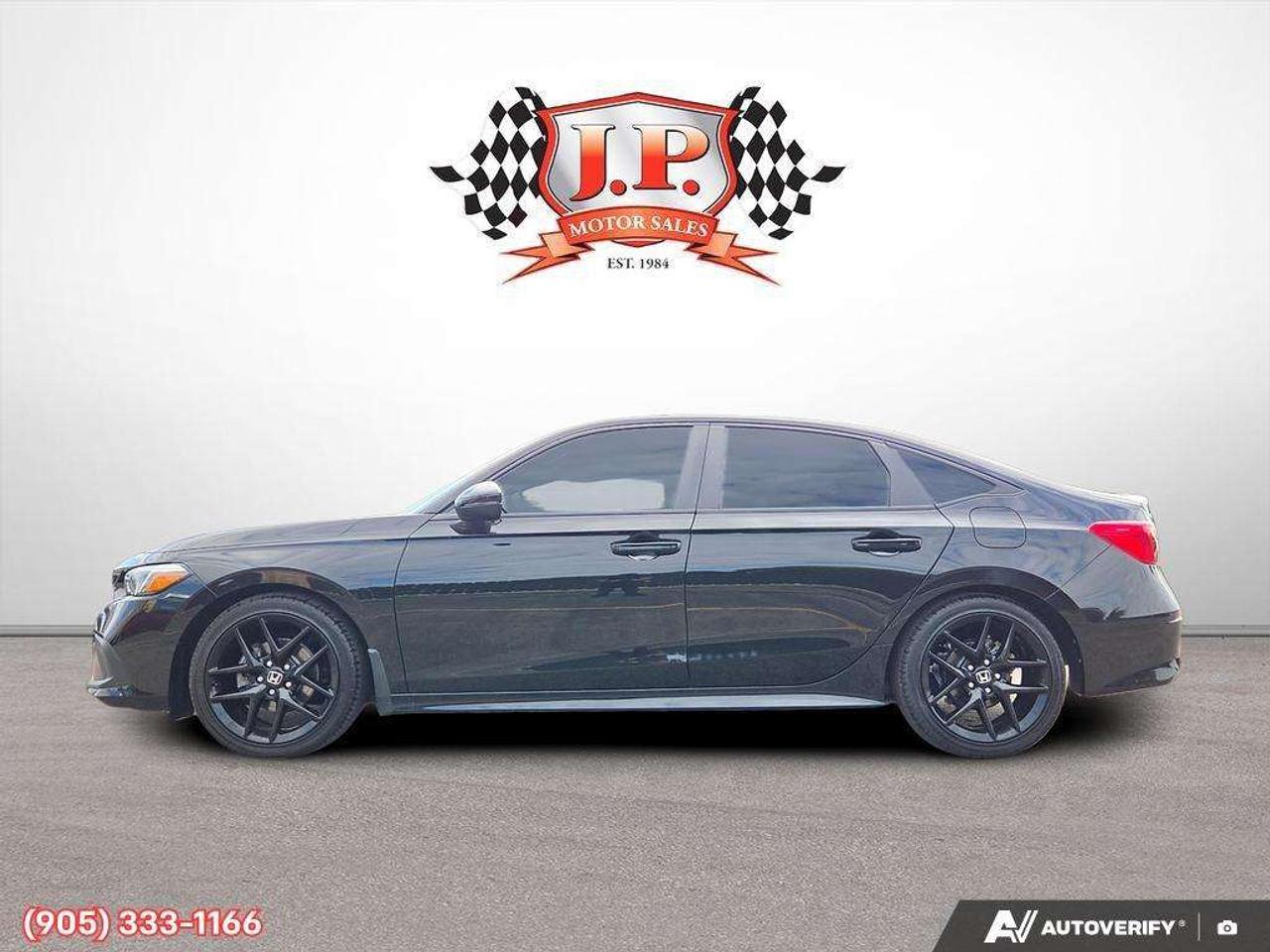 2023 Honda Civic Sport Apple CarPlay & Android Auto • Power Sunroof • Remote Start System • Heated Front Seats • Lane Assist • Backup Came Photo