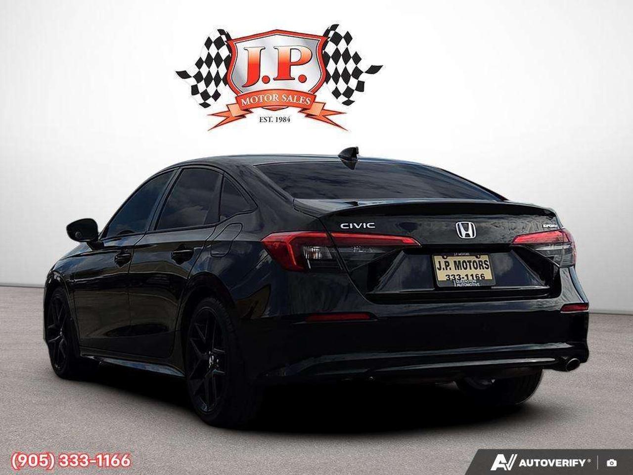 2023 Honda Civic Sport Apple CarPlay & Android Auto • Power Sunroof • Remote Start System • Heated Front Seats • Lane Assist • Backup Came Photo