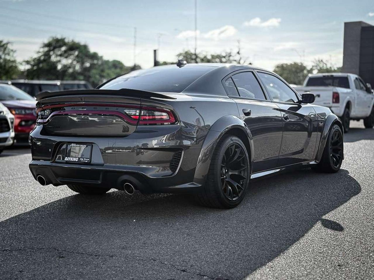 2023 Dodge Charger Scat Pack 392   WIDEBODY   HEMI ORANGE PKG   FRONT 3M   PLUS GROUP   CARBON AND SUEDE PKG   SUNROOF Photo