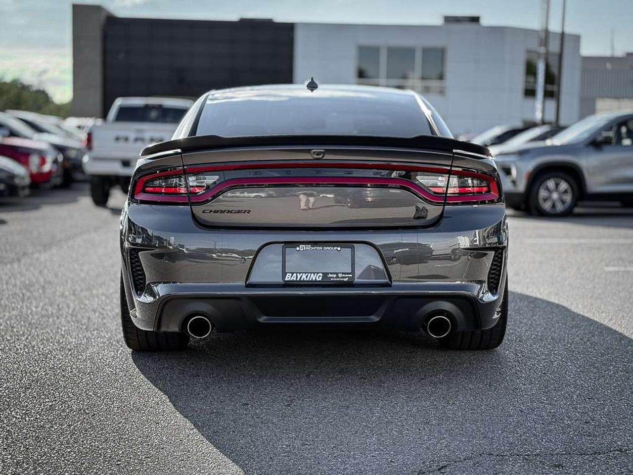 2023 Dodge Charger Scat Pack 392   WIDEBODY   HEMI ORANGE PKG   FRONT 3M   PLUS GROUP   CARBON AND SUEDE PKG   SUNROOF Photo