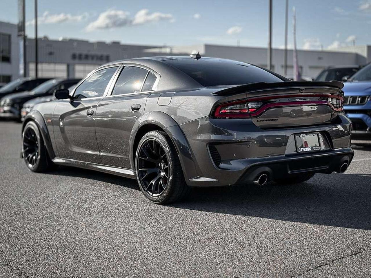 2023 Dodge Charger Scat Pack 392   WIDEBODY   HEMI ORANGE PKG   FRONT 3M   PLUS GROUP   CARBON AND SUEDE PKG   SUNROOF Photo